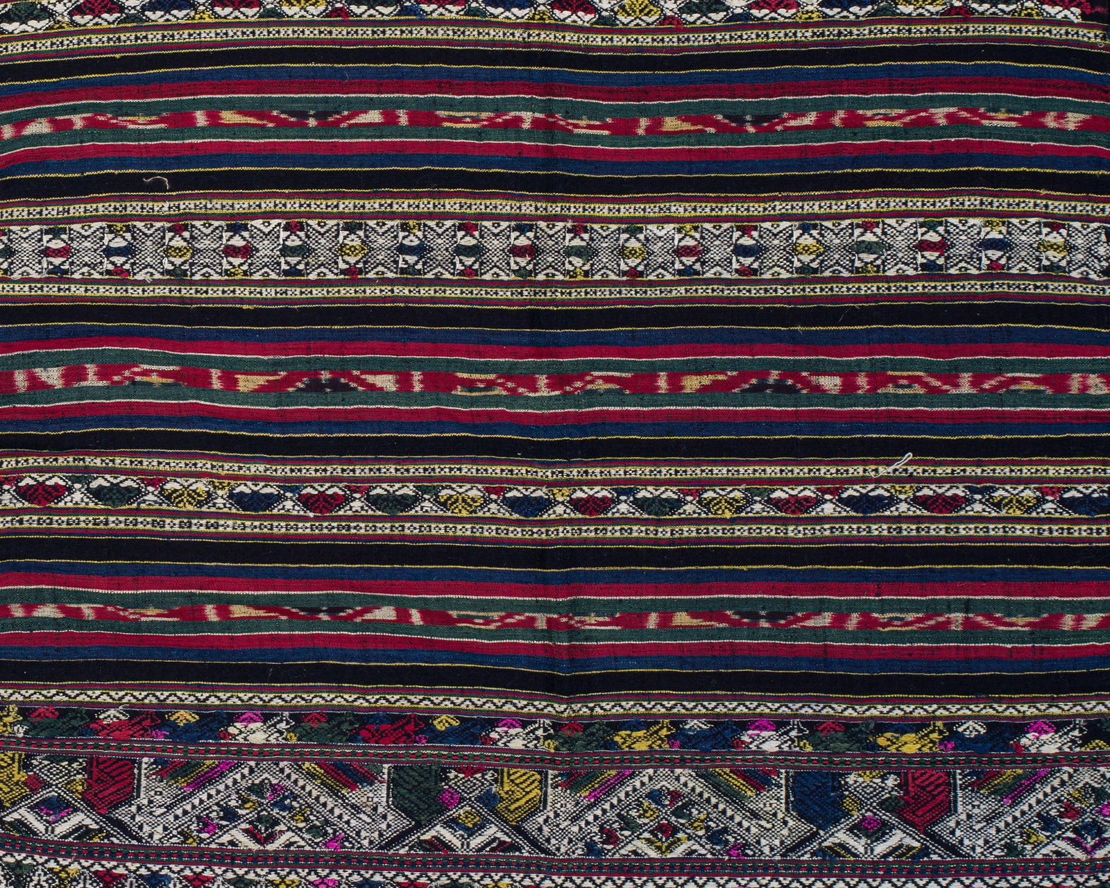 A FINE SILK IKAT WOMAN'S CEREMONIAL SKIRT (SARONG), TAI NUEA PEOPLE: A FINE SILK IKAT WOMAN'S CEREMONIAL SKIRT (SARONG), TAI NUEA PEOPLE This lot is from a single owner collection and is therefore offered without reserve Northeast Laos, Hua Phan Province, late 19th to 
