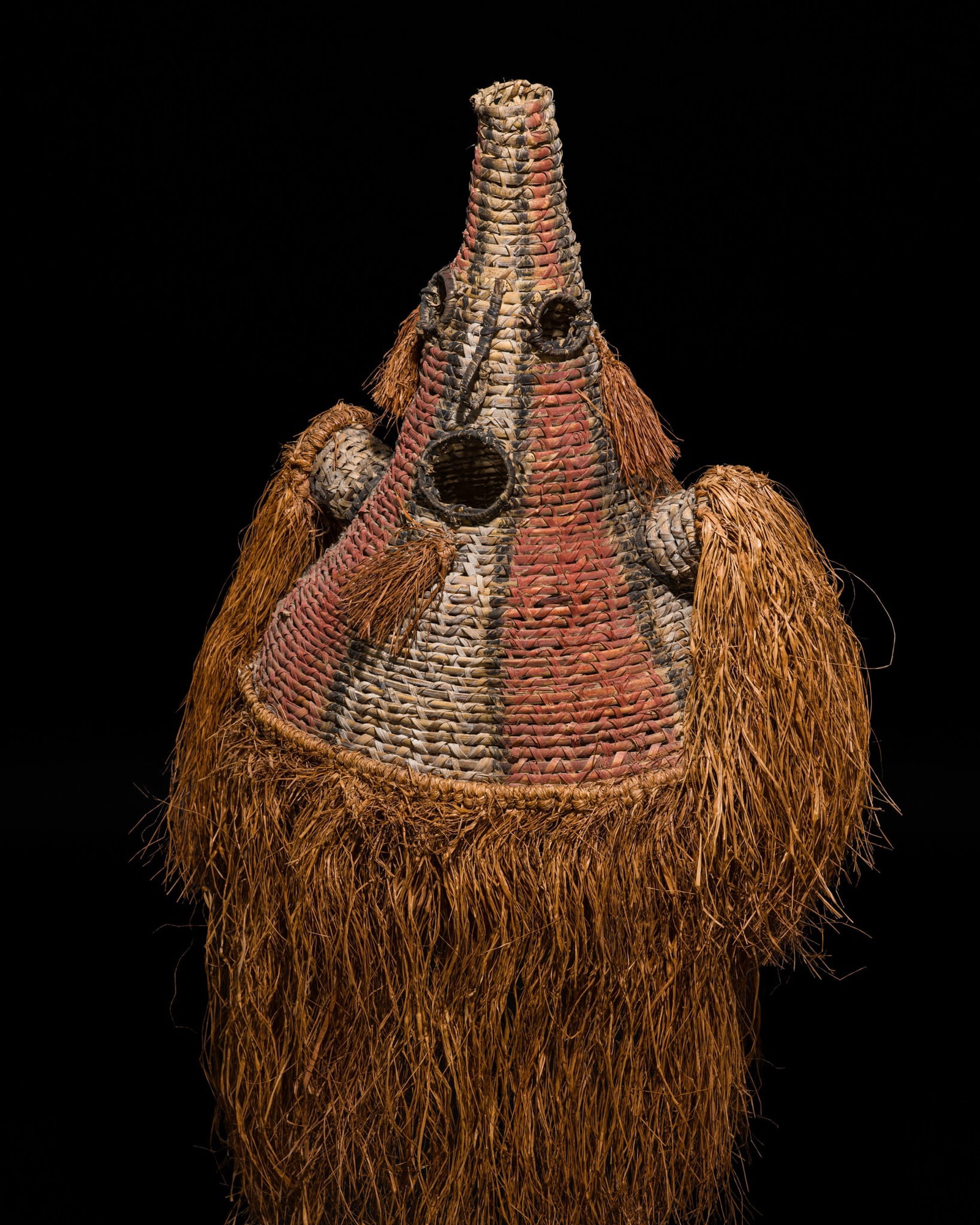 A POLYCHROME WICKERWORK CEREMONIAL SPIRIT MASK, ASMAT PEOPLE (1 of 14)