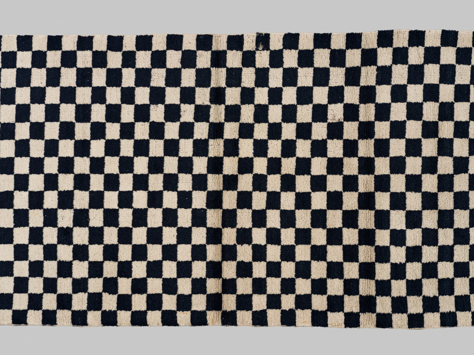 A WOOLEN TIBETAN CHEQUERBOARD KHADEN RUG (1 of 9)