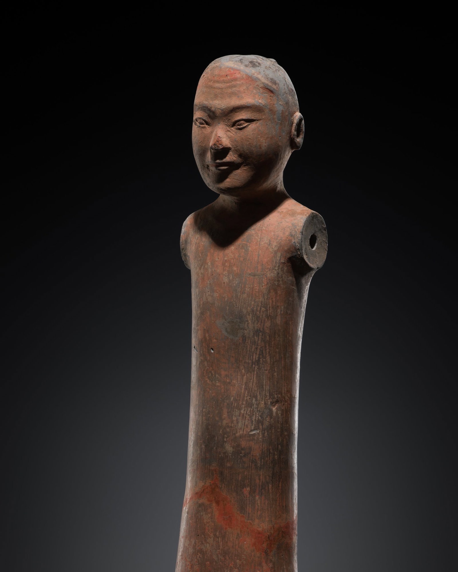 A PAINTED POTTERY 'STICK' FIGURINE, HAN DYNASTY: A PAINTED POTTERY 'STICK' FIGURINE, HAN DYNASTY This lot is from a single owner collection and is therefore offered without reserve The Jorgen Ruben Gallery Ledger, entry from 2005: “No. 236, FH