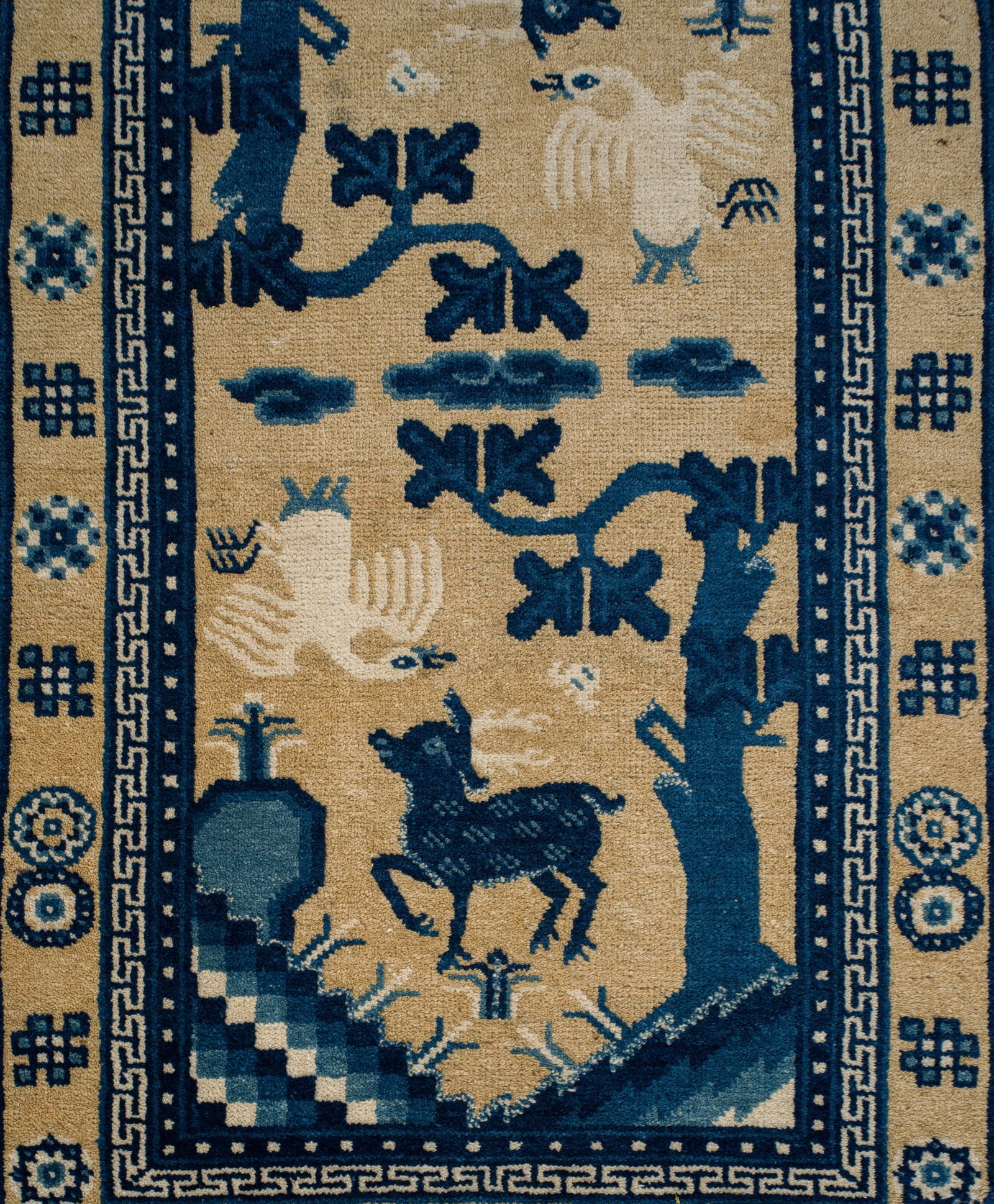 A NINGXIA 'LONGEVITY' WOOL CARPET, 19TH CENTURY: A NINGXIA 'LONGEVITY' WOOL CARPET, 19TH CENTURY This lot is from a single owner collection and is therefore offered without reserve North China. Finely woven in shades of deep blue and pale yellow, fe