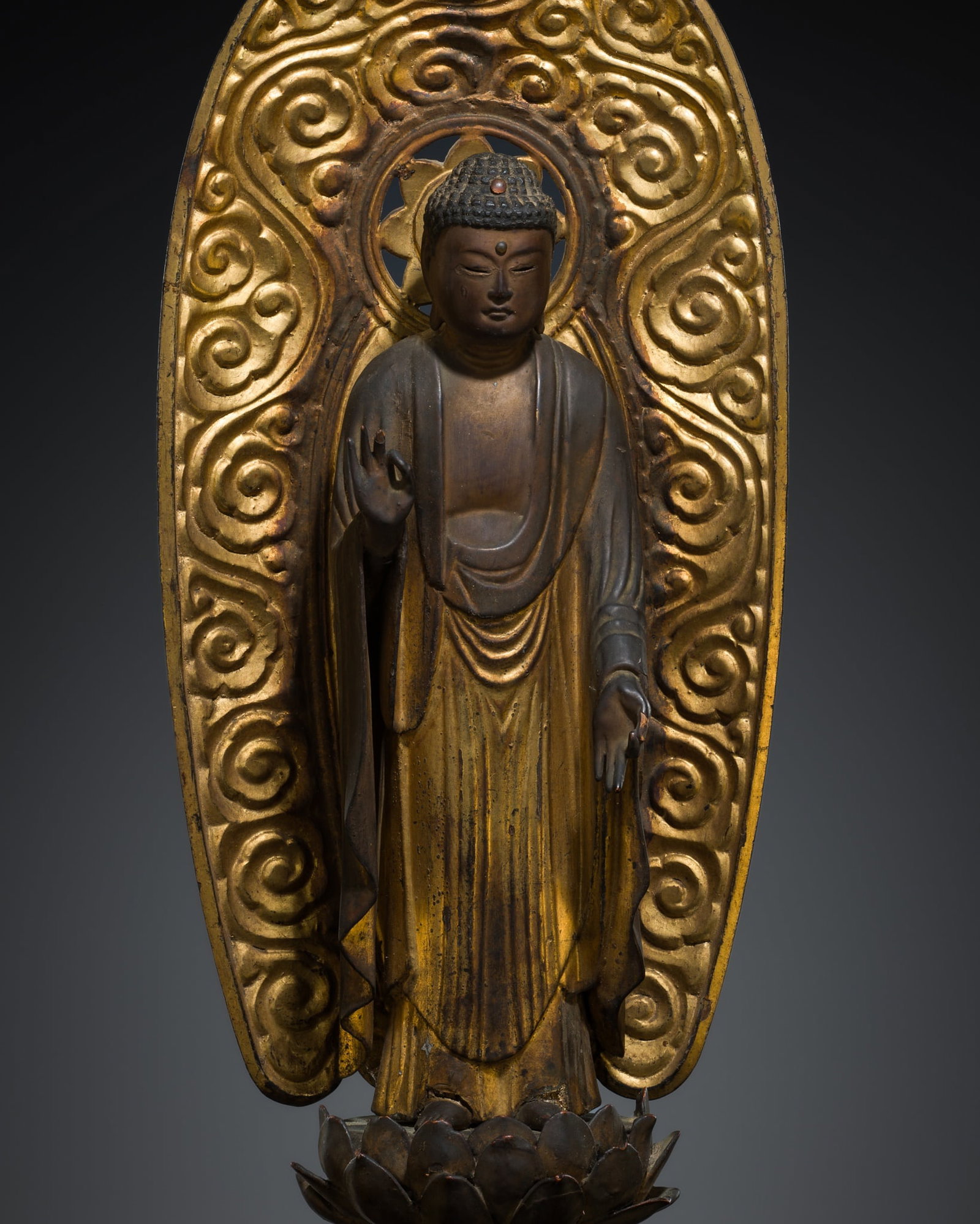 A FINE GILT-LACQUERED WOOD FIGURE OF AMIDA NYORAI, EDO PERIOD: A FINE GILT-LACQUERED WOOD FIGURE OF AMIDA NYORAI, EDO PERIOD This lot is from a single owner collection and is therefore offered without reserve The Jorgen Ruben Gallery Ledger, entry from 2005: R