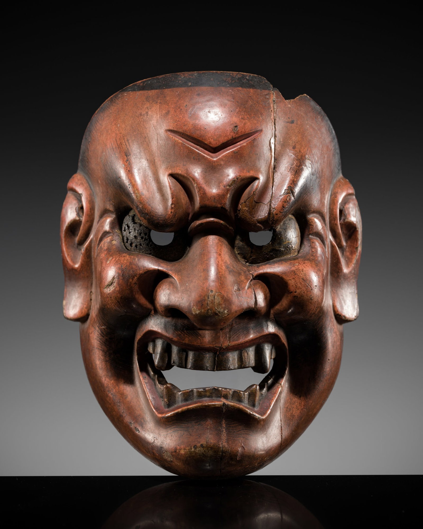 A LACQUERED WOOD NOH MASK OF SHIKAMI, EDO PERIOD, 17TH-18TH CENTURY: A LACQUERED WOOD NOH MASK OF SHIKAMI, EDO PERIOD, 17TH-18TH CENTURY This lot is from a single owner collection and is therefore offered without reserve The Jorgen Ruben Gallery Ledger, entry from 2005