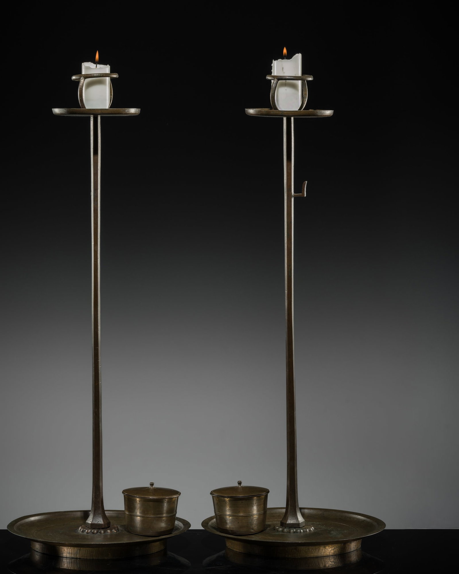 A PAIR OF BRONZE TEMPLE CANDLESTICKS, SHOKUDAI, EDO PERIOD: A PAIR OF BRONZE TEMPLE CANDLESTICKS, SHOKUDAI, EDO PERIOD This lot is from a single owner collection and is therefore offered without reserve Japan, 1615-1868. Each with a straight shaft with threade
