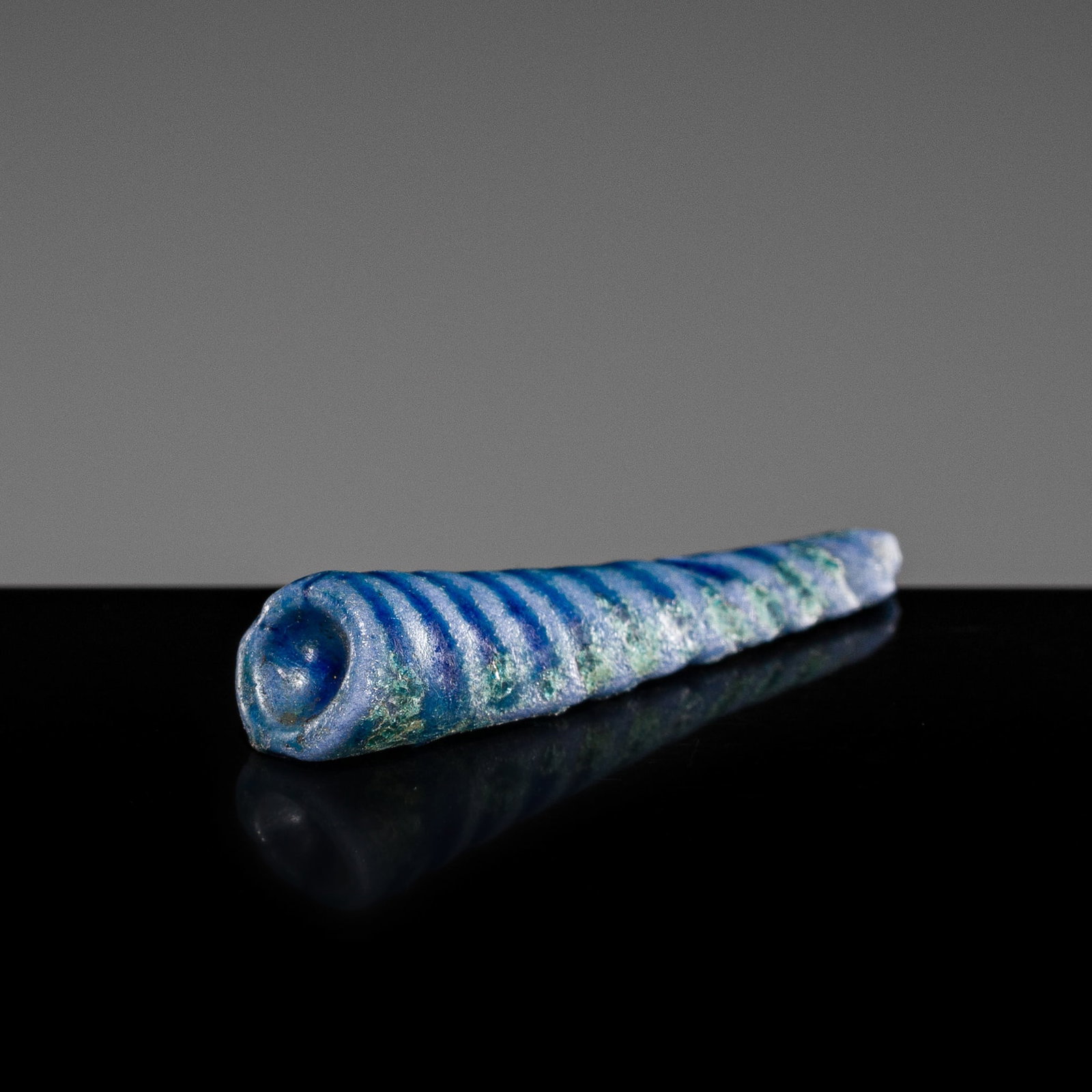 A SMALL EGYPTIAN LAPIS LAZULI DIVINE FALSE BEARD, LATE TO HELLENISTIC PERIOD (1 of 11)