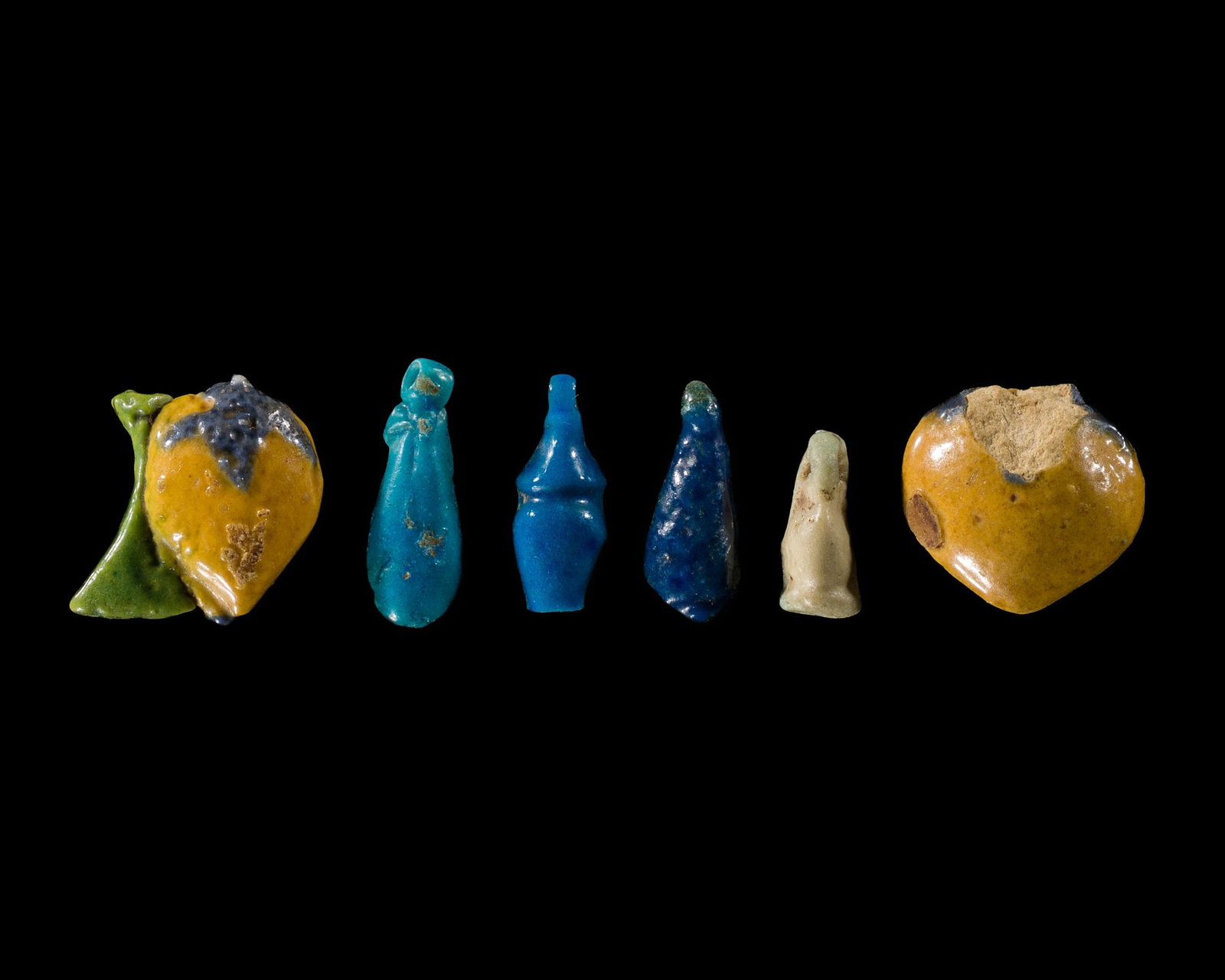 A GROUP OF SIX FAIENCE AMULETS, NEW KINGDOM, DYNASTY XVIII (1 of 10)