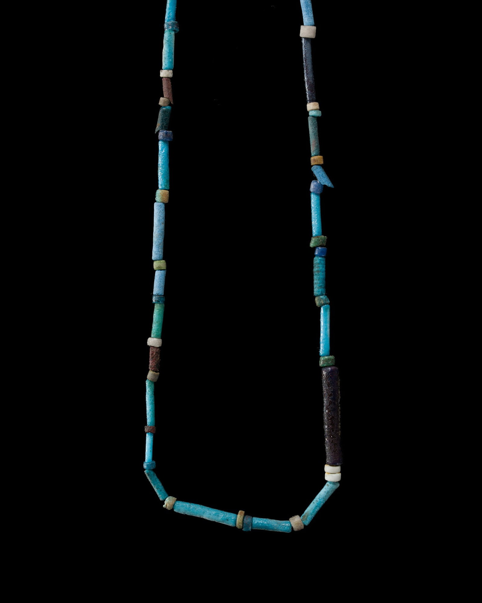 AN EGYPTIAN FAIENCE NECKLACE, LATE PERIOD: AN EGYPTIAN FAIENCE NECKLACE, LATE PERIOD This lot is from a single owner collection and is therefore offered without reserve The Jorgen Ruben Gallery Ledger, entry from 2012: “No. 728, Egyptian
