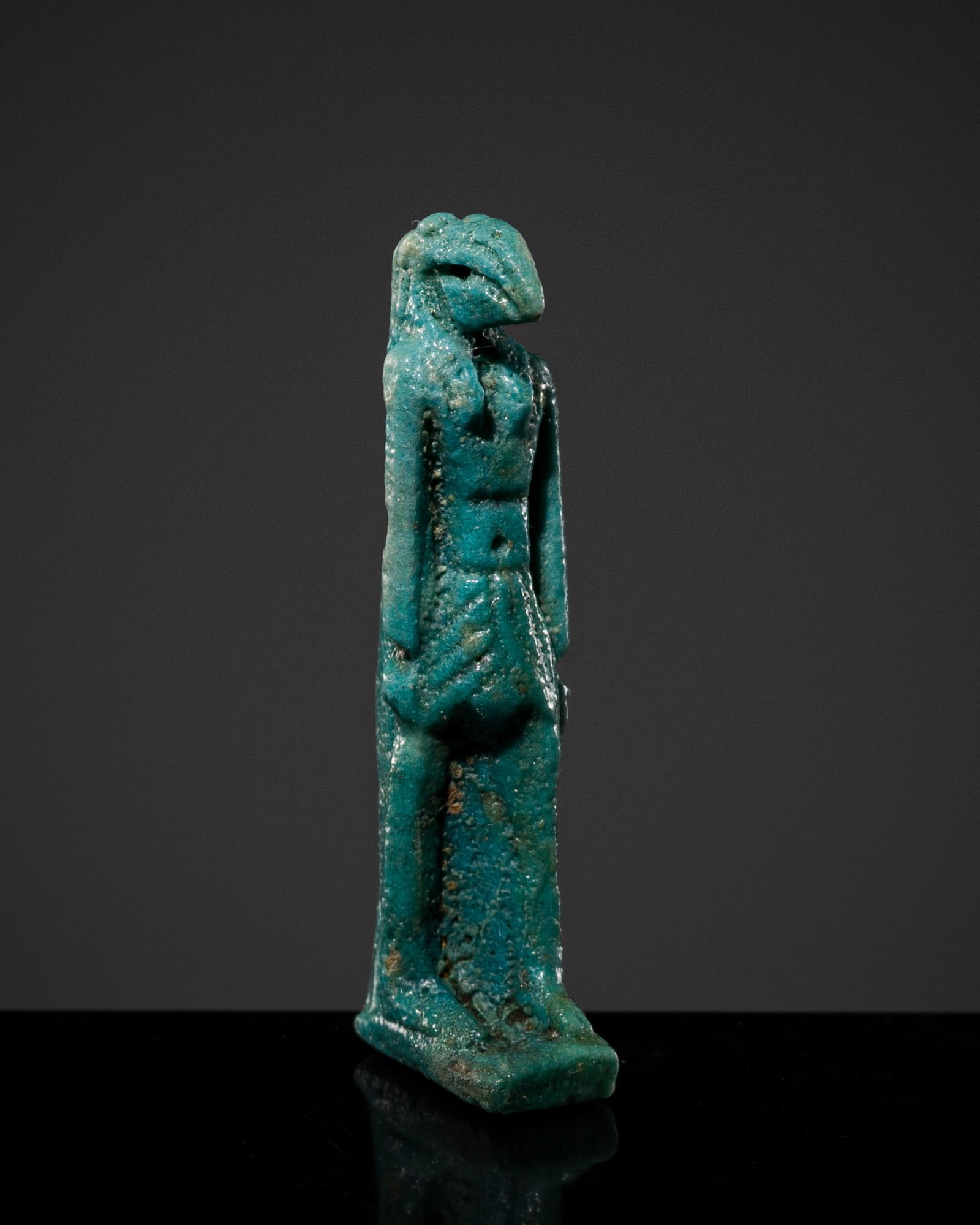 A TURQUOISE FAIENCE AMULET OF THOTH, LATE PERIOD (1 of 12)