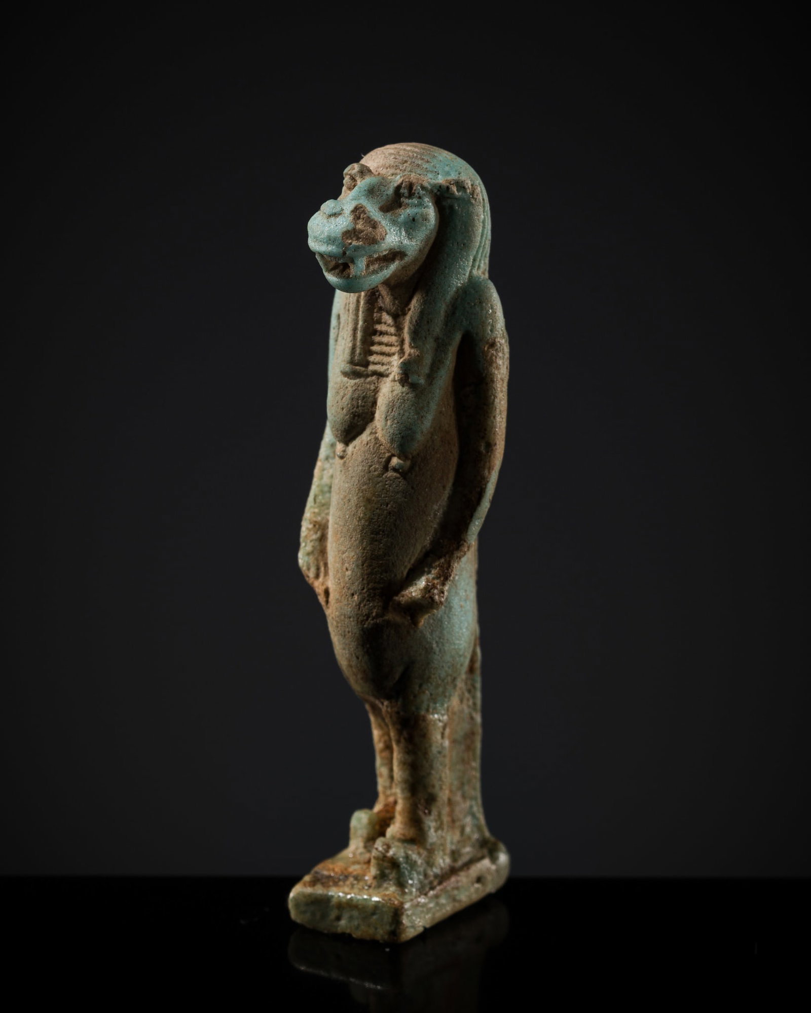 A TURQUOISE FAIENCE AMULET OF TAWERET, LATE PERIOD, DYNASTY XXVI-XXX: A TURQUOISE FAIENCE AMULET OF TAWERET, LATE PERIOD, DYNASTY XXVI-XXX This lot is from a single owner collection and is therefore offered without reserve Egypt, 664-343 BC. Combining elements of a hipp