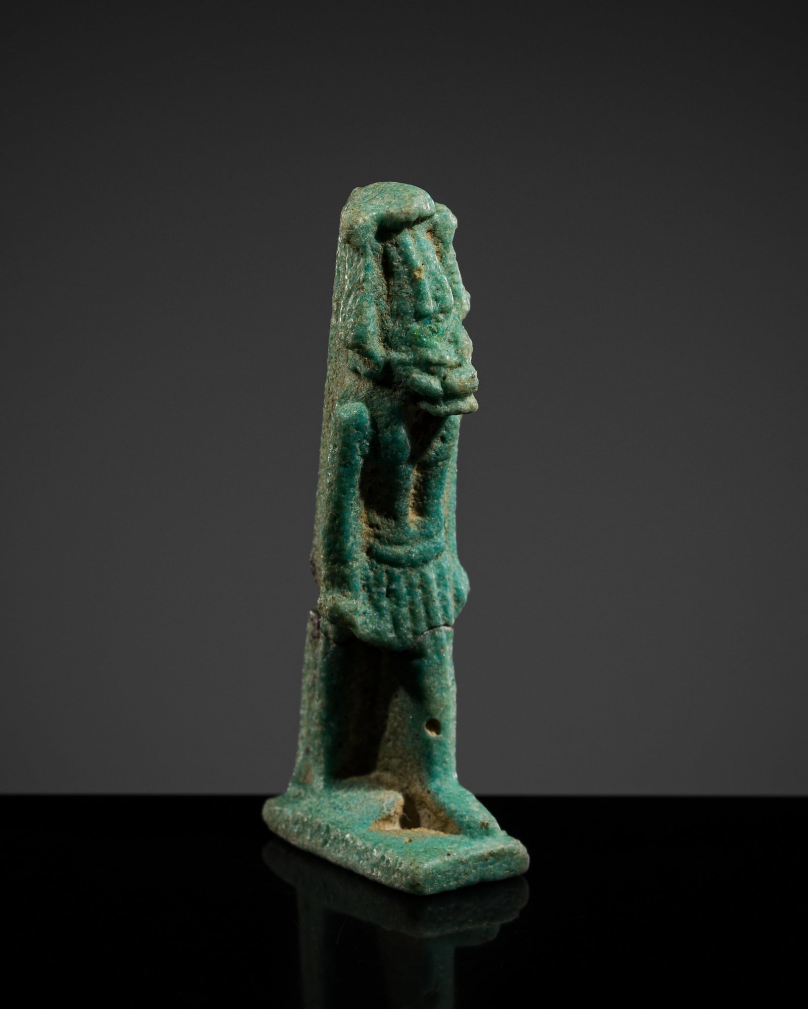 A TURQUOISE FAIENCE 'MAHES' AMULET, LATE PERIOD-PTOLEMAIC PERIOD: A TURQUOISE FAIENCE 'MAHES' AMULET, LATE PERIOD-PTOLEMAIC PERIOD This lot is from a single owner collection and is therefore offered without reserve Egypt, 664-30 BC. Finely modeled, the anthropomorph