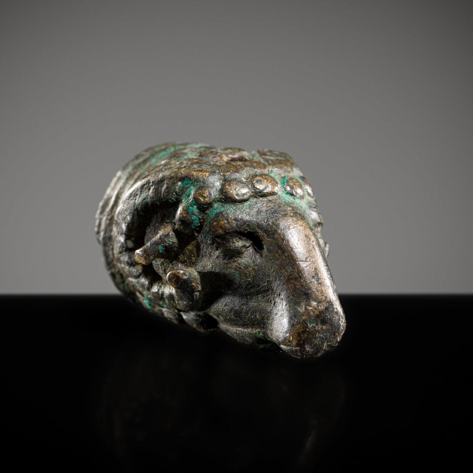 A ROMAN BRONZE RAM'S HEAD, 1ST CENTURY BC-1ST CENTURY AD (1 of 12)