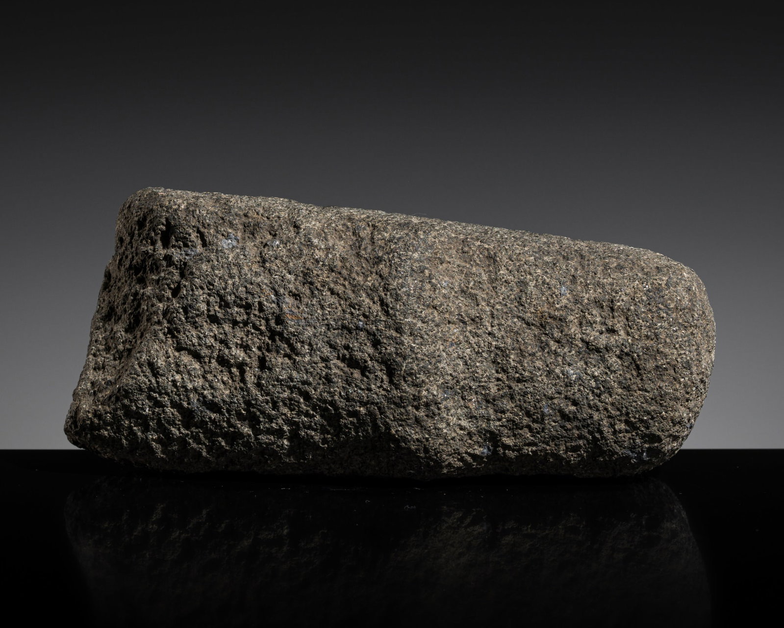 A STONE AXE HEAD, ARCHAIC PERIOD: A STONE AXE HEAD, ARCHAIC PERIOD This lot is from a single owner collection and is therefore offered without reserve The Jorgen Ruben Gallery Ledger, entry from 2005: “No. 217, OK 2006, North Am