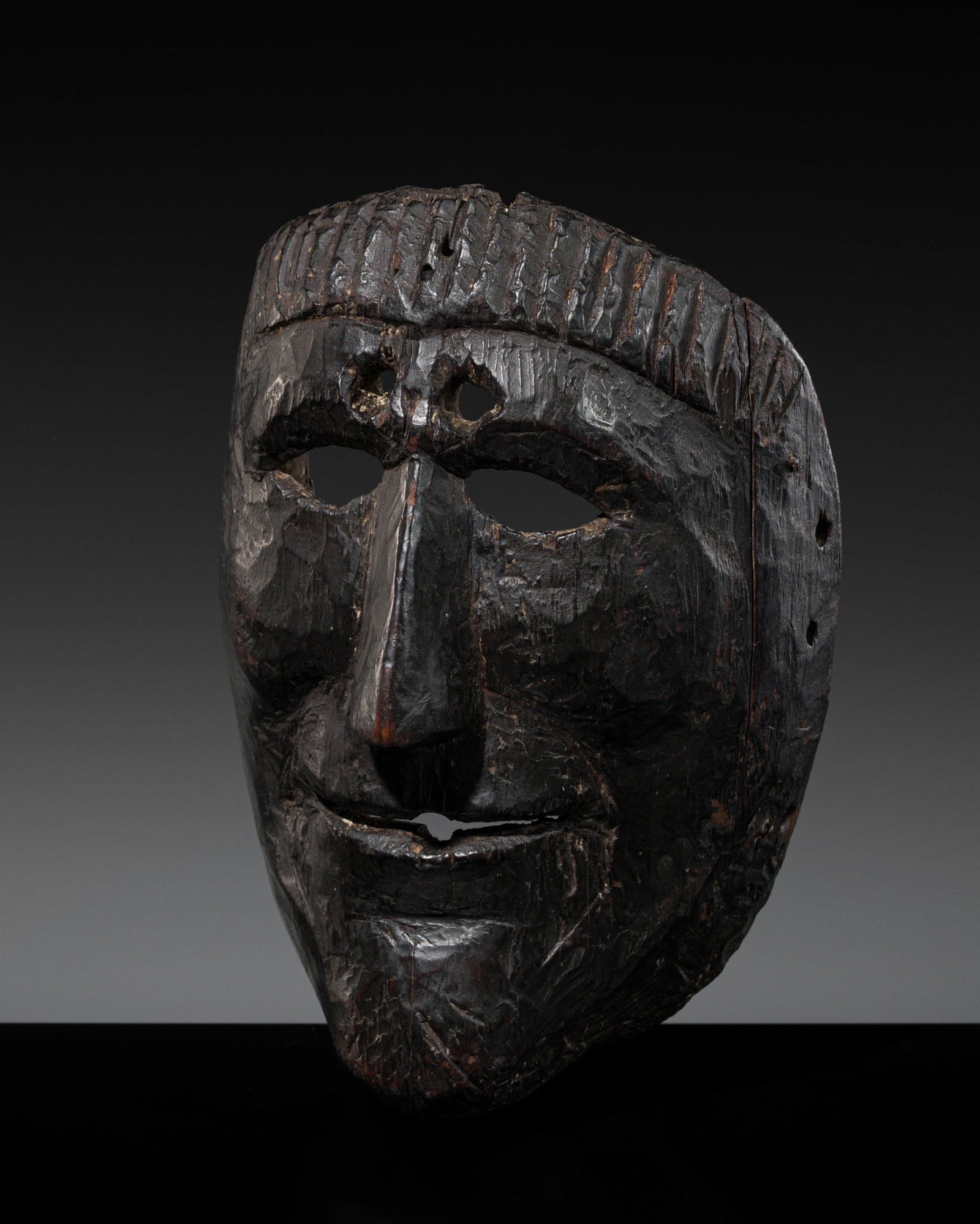 A WOOD CONQUEST MASK OF SAN PEDRO, GUATEMALA, 18TH-19TH CENTURY (1 of 12)