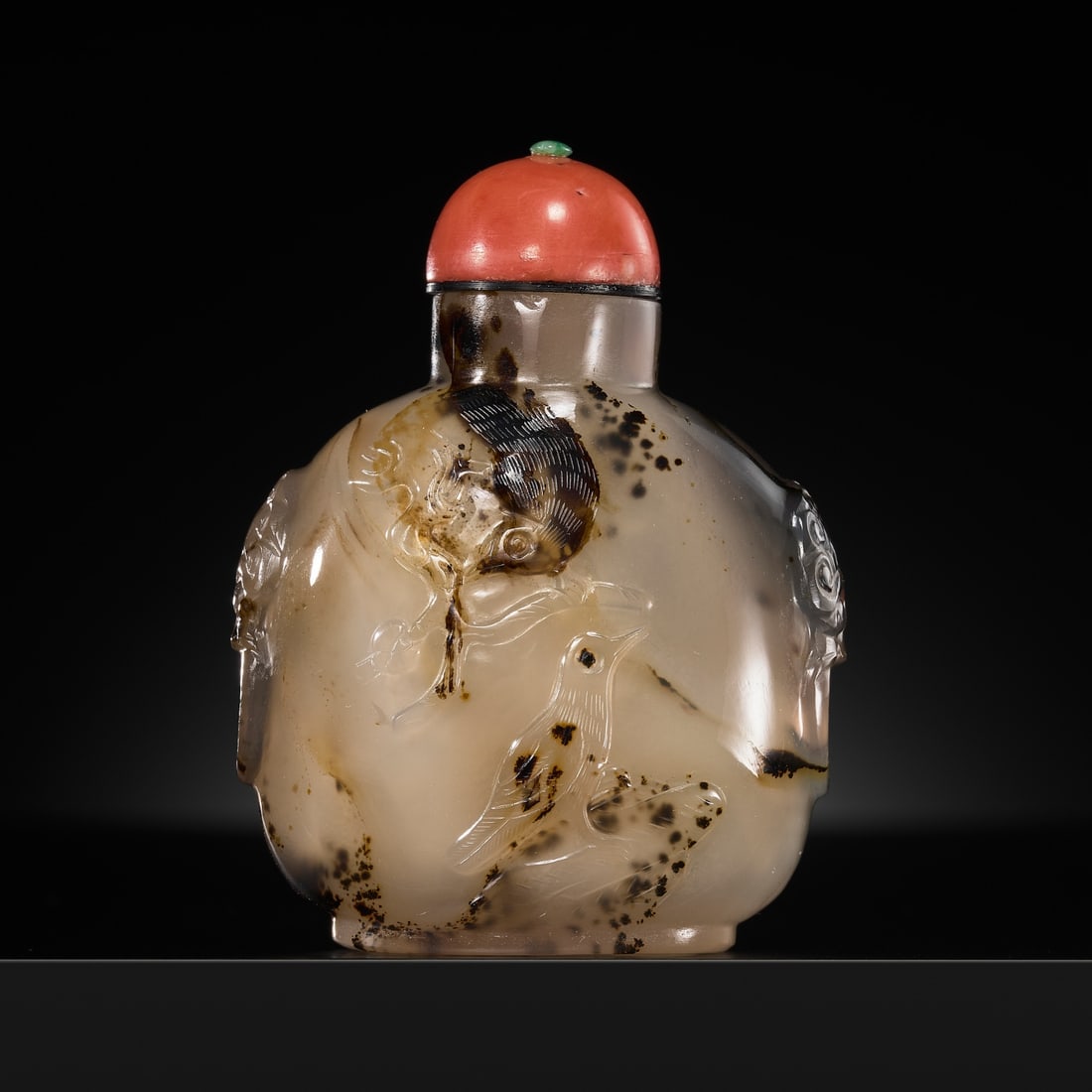 A CAMEO AGATE 'BIRDS ON BLOSSOMING TREE' SNUFF BOTTLE, OFFICIAL SCHOOL, 1750-1850 (1 of 12)