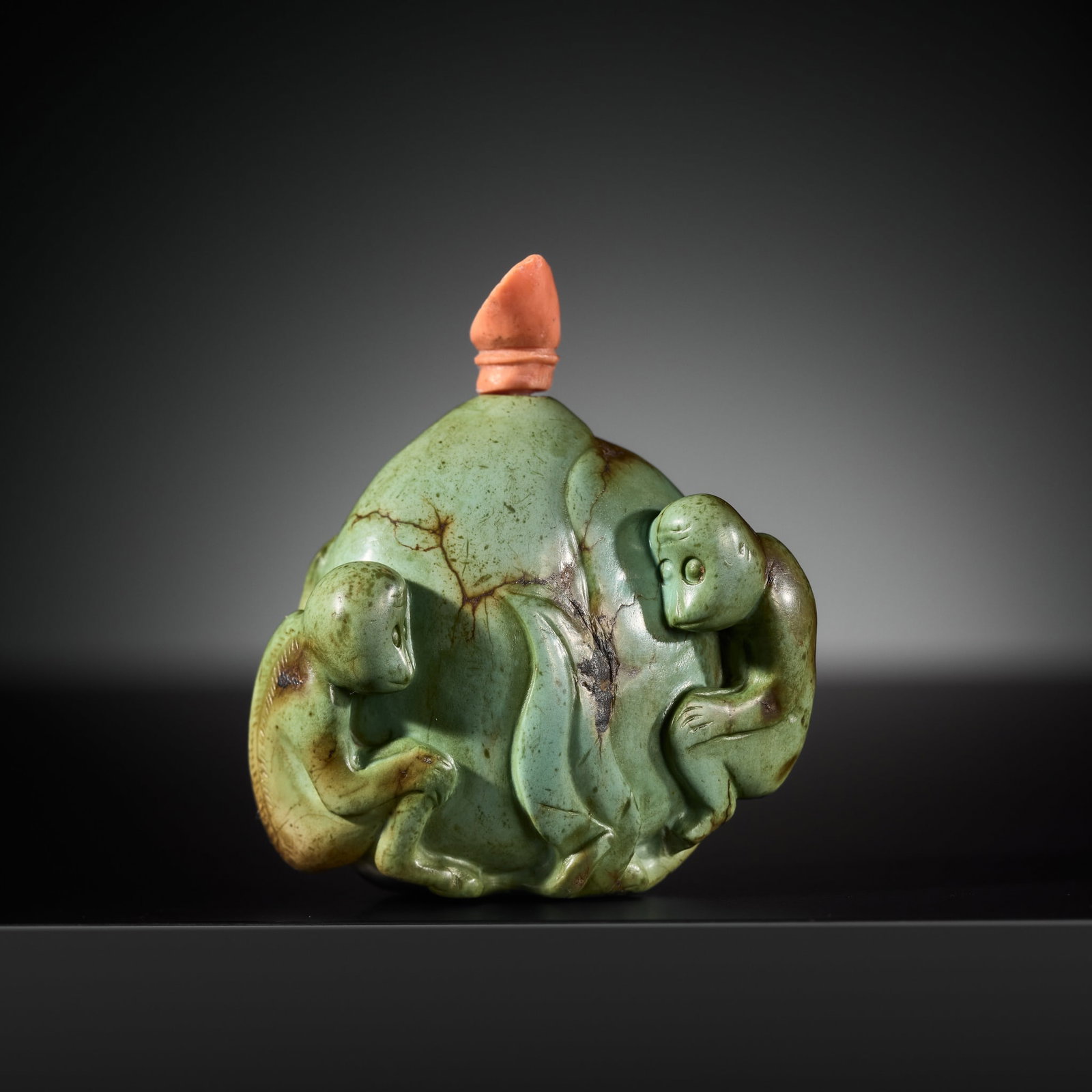 AN EXCEEDINGLY RARE TURQUOISE MATRIX 'MONKEYS AND PEACH' SNUFF BOTTLE, 1760-1830: AN EXCEEDINGLY RARE TURQUOISE MATRIX 'MONKEYS AND PEACH' SNUFF BOTTLE, 1760-1830 China, probably Imperial workshops Beijing. Well hollowed, finely rendered as a large peach with a small mouth, the bot