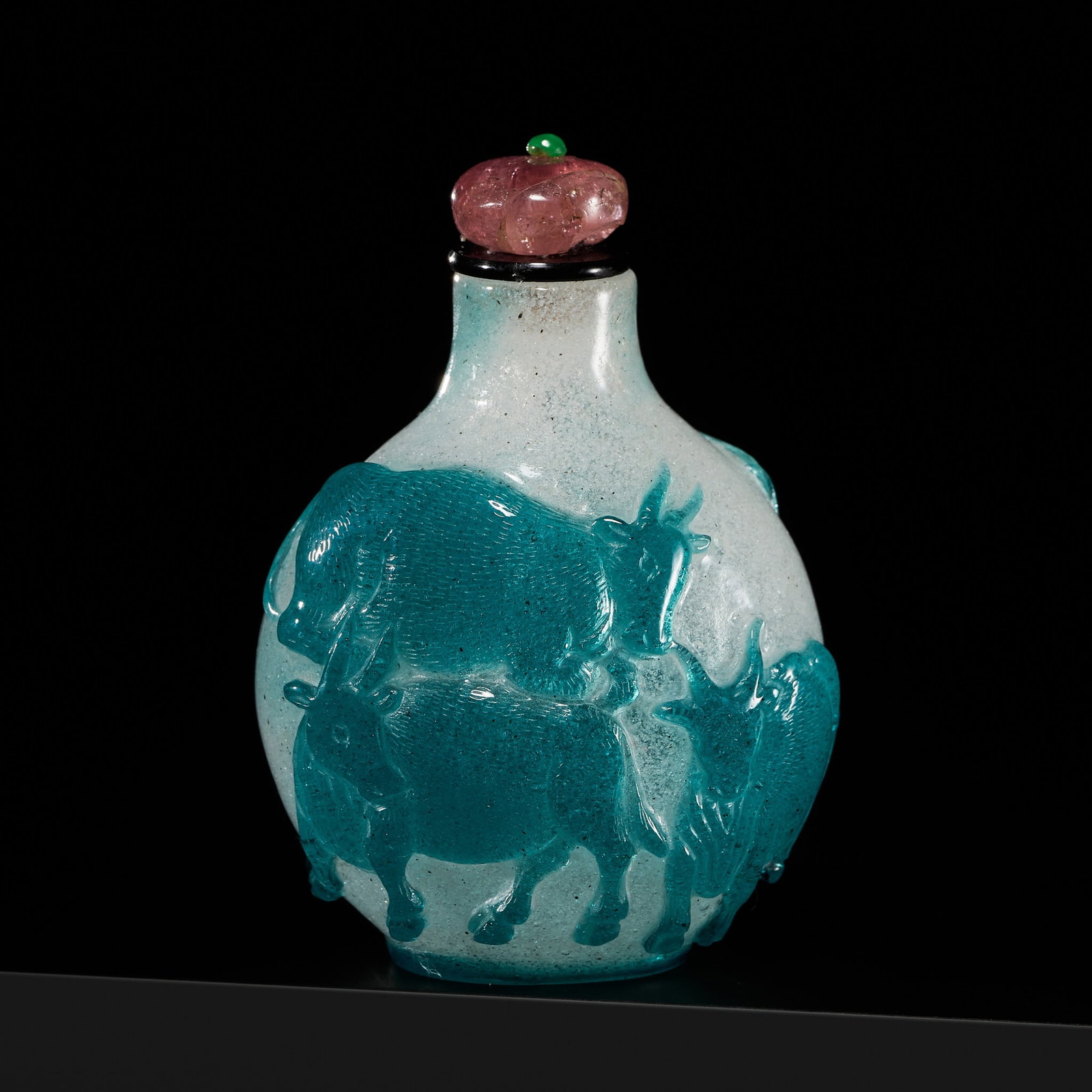 A RARE AND INSCRIBED TURQUOISE-GREEN OVERLAY 'NIGHT-SHINING WHITE' SNOWFLAKE GLASS SNUFF BOTTLE,: A RARE AND INSCRIBED TURQUOISE-GREEN OVERLAY 'NIGHT-SHINING WHITE' SNOWFLAKE GLASS SNUFF BOTTLE, EARLY 19TH CENTURY China. Of flattened globular form, raised on an oval foot and tapering towards the c
