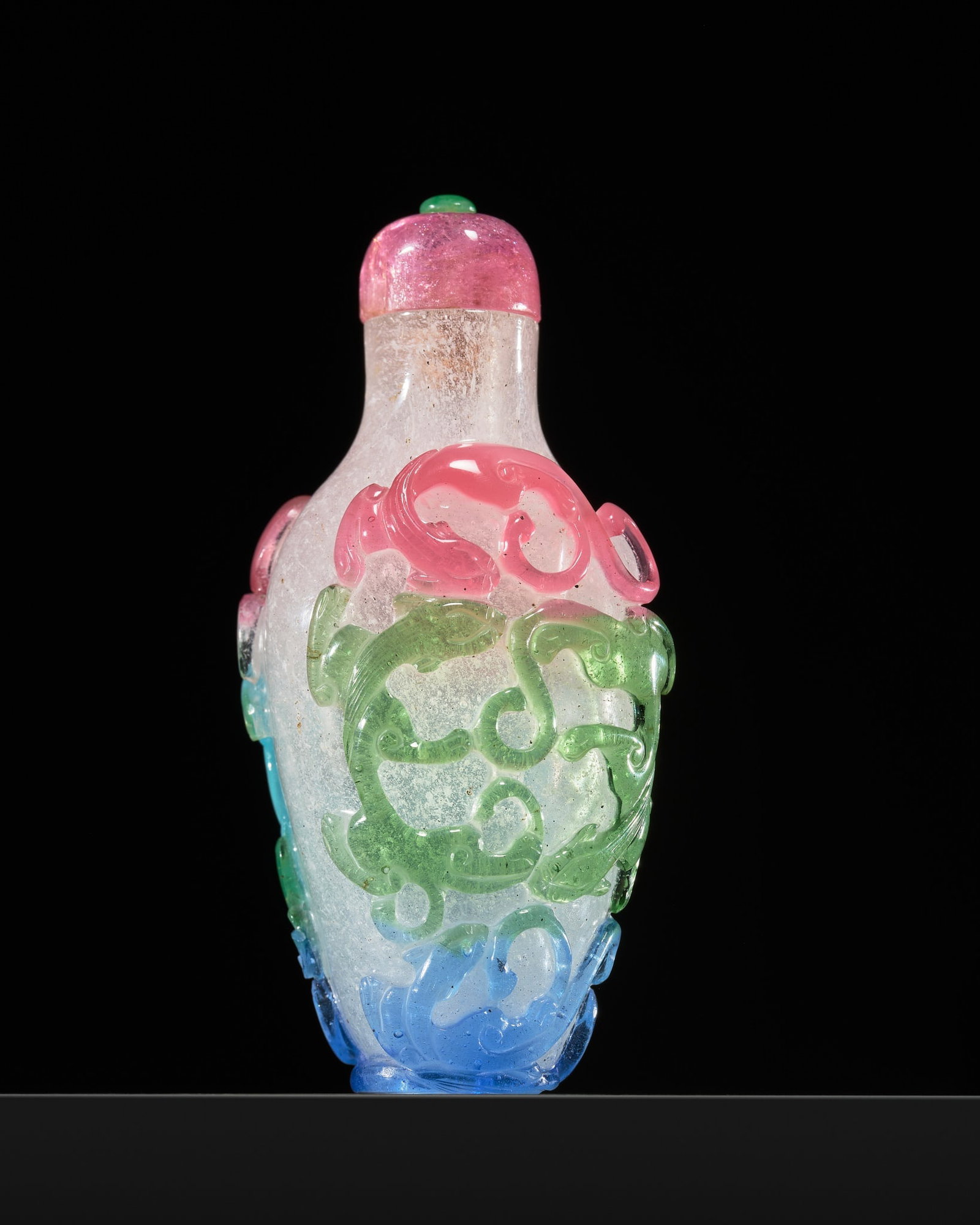 AN IMPERIAL FOUR-COLOR OVERLAY 'EIGHT CHILONG' SNOWFLAKE GLASS SNUFF BOTTLE, 1750-1820: AN IMPERIAL FOUR-COLOR OVERLAY 'EIGHT CHILONG' SNOWFLAKE GLASS SNUFF BOTTLE, 1750-1820 Published: Sotheby's Auction: Important Chinese Snuff Bottles from the Kaynes-Klitz Collection, Part I: 16 Novemb