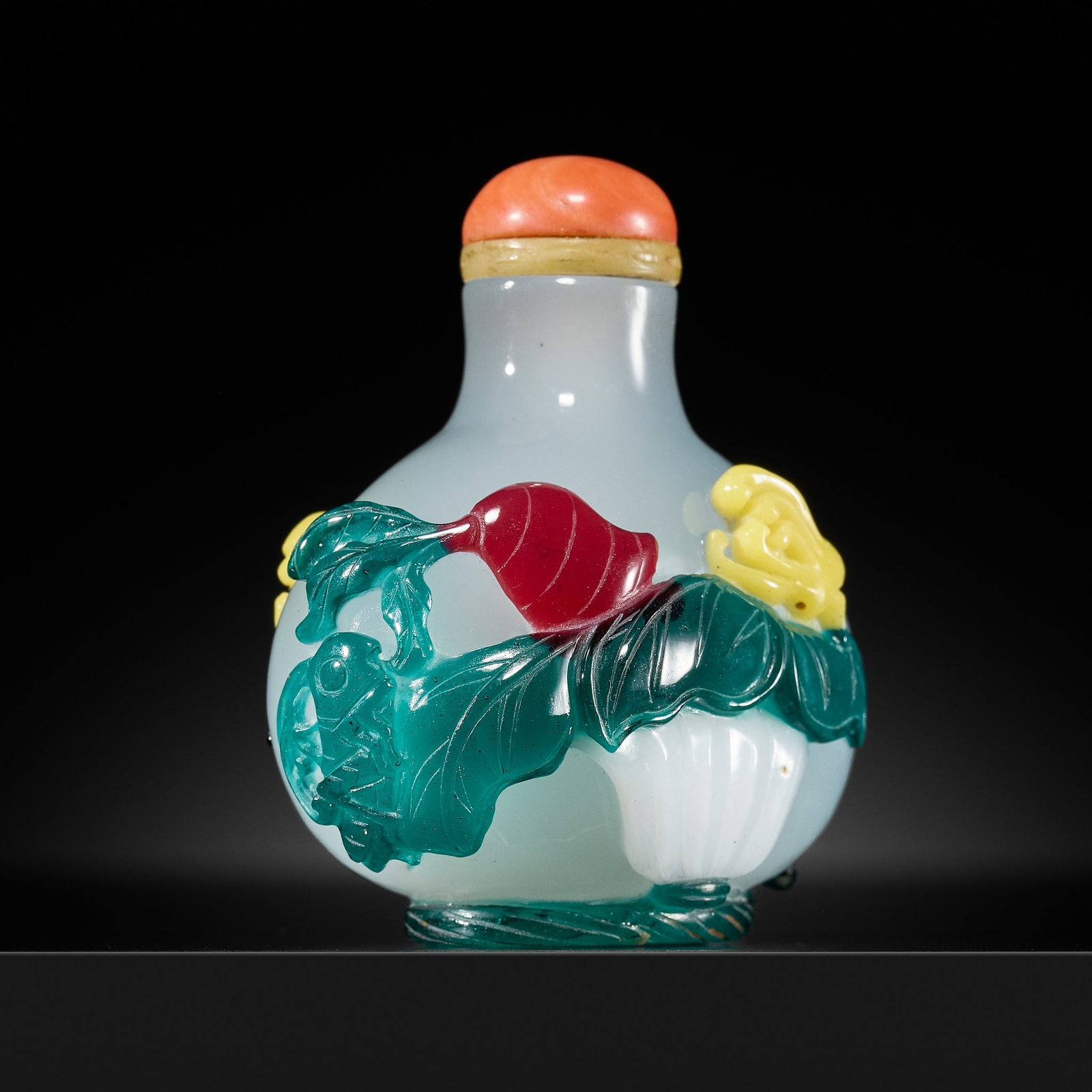 A FOUR-COLOR OVERLAY 'GRASSHOPPER AND FRUITS' GLASS SNUFF BOTTLE, 19TH CENTURY: A FOUR-COLOR OVERLAY 'GRASSHOPPER AND FRUITS' GLASS SNUFF BOTTLE, 19TH CENTURY China. Of compressed globular form with gently waisted neck and flat lip, overlaid in vibrant turquoise, lemon-yellow, wh