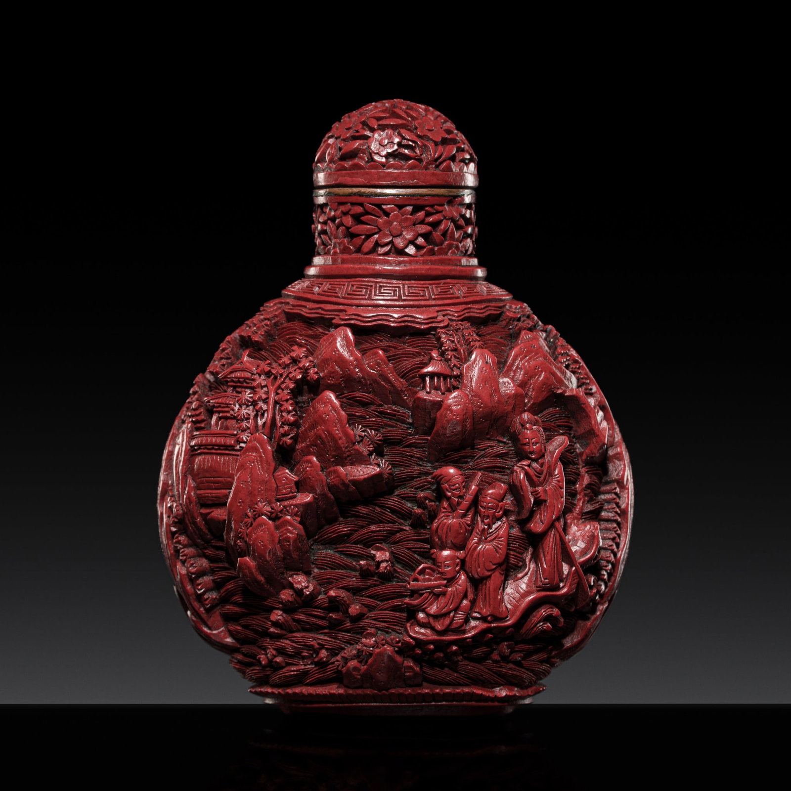 A LARGE CINNABAR LACQUER 'EIGHT IMMORTALS' SNUFF BOTTLE, 1860-1880 (1 of 13)