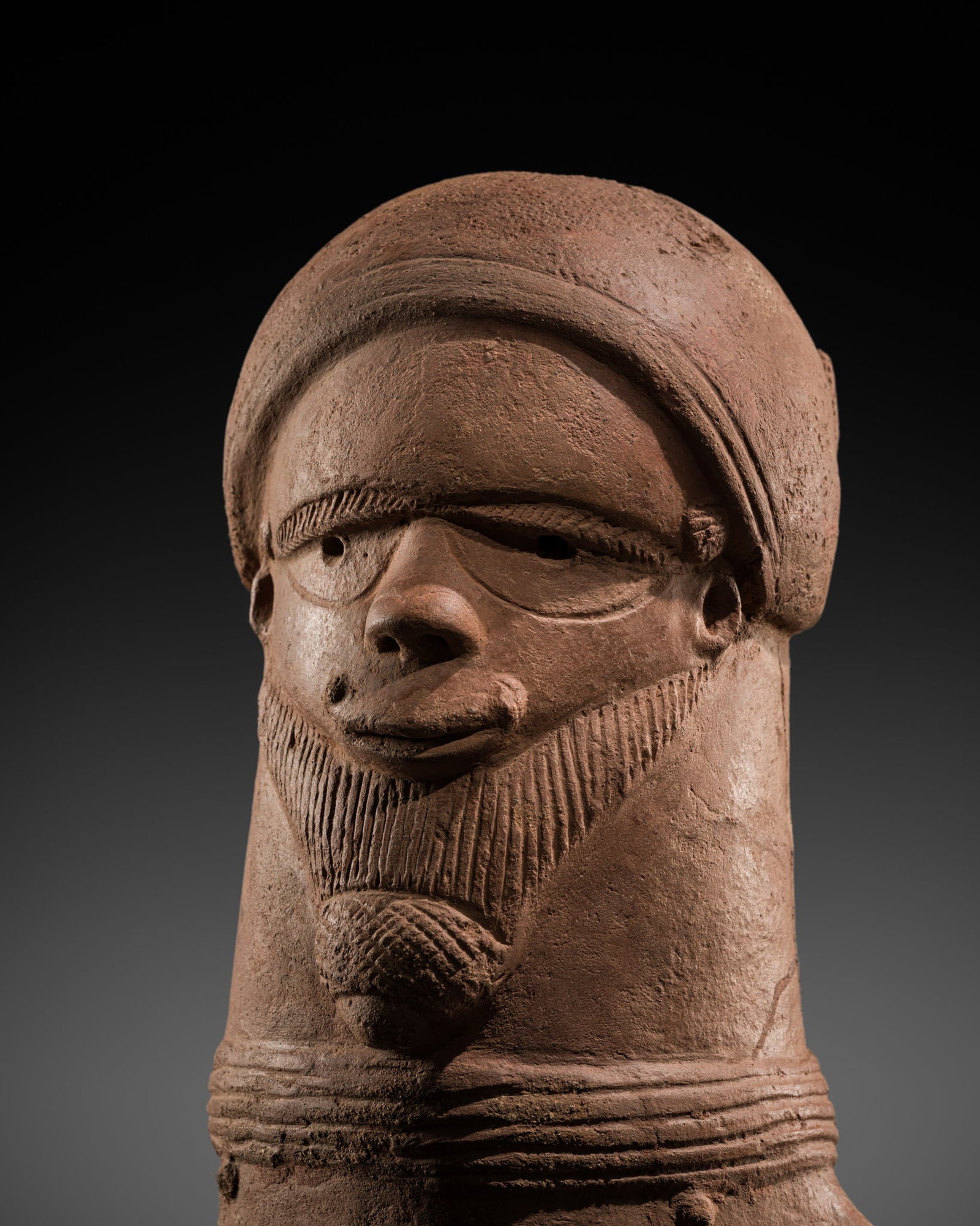 A TERRACOTTA FIGURE OF A MAN, SOKOTO CULTURE, NIGERIA, 500 BC-200 AD (1 of 17)