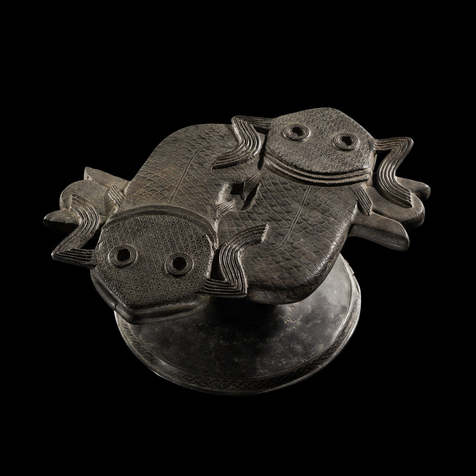 A RARE AND EXCEPTIONAL BENIN BRONZE 'TWIN MUDFISH' STOOL, 17TH CENTURY (1 of 20)