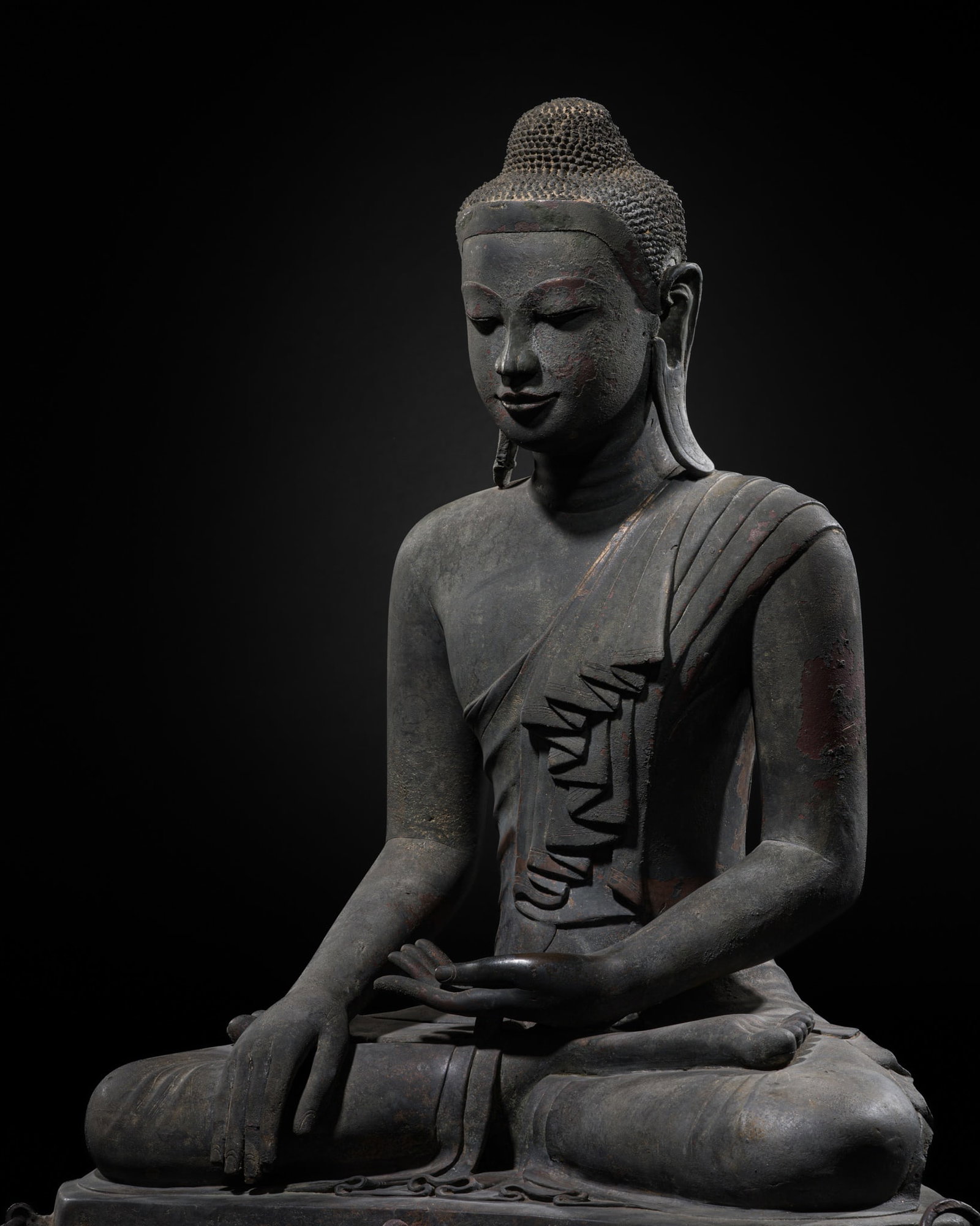 A LARGE BRONZE FIGURE OF BUDDHA SHAKYAMUNI, MANDALAY PERIOD: A LARGE BRONZE FIGURE OF BUDDHA SHAKYAMUNI, MANDALAY PERIOD This lot is from a single owner collection and is therefore offered without reserve Scientific Analysis Report: A thermoluminescence analysi