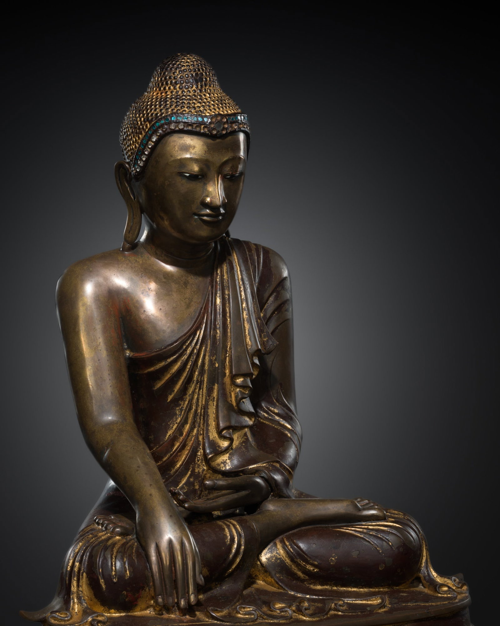 A FINE GILT-LACQUERED BRONZE FIGURE OF BUDDHA SHAKYAMUNI, MANDALAY PERIOD: A FINE GILT-LACQUERED BRONZE FIGURE OF BUDDHA SHAKYAMUNI, MANDALAY PERIOD This lot is from a single owner collection and is therefore offered without reserve Burma, 19th century. Finely cast, depicted