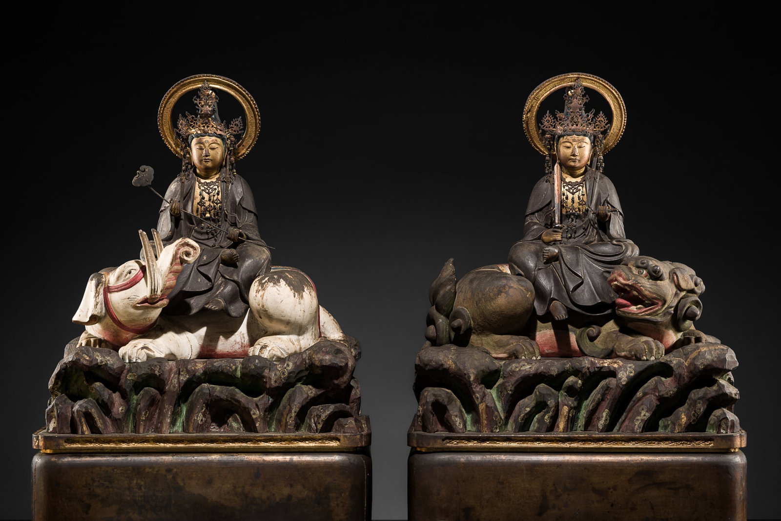 AN EXCEPTIONAL PAIR OF POLYCHROME AND GILT-LACQUERED WOOD FIGURES DEPICTING MONJU AND FUGEN BOSATSU,: AN EXCEPTIONAL PAIR OF POLYCHROME AND GILT-LACQUERED WOOD FIGURES DEPICTING MONJU AND FUGEN BOSATSU, LATE MUROMACHI-EARLY EDO PERIOD This lot is from a single owner collection and is therefore offered