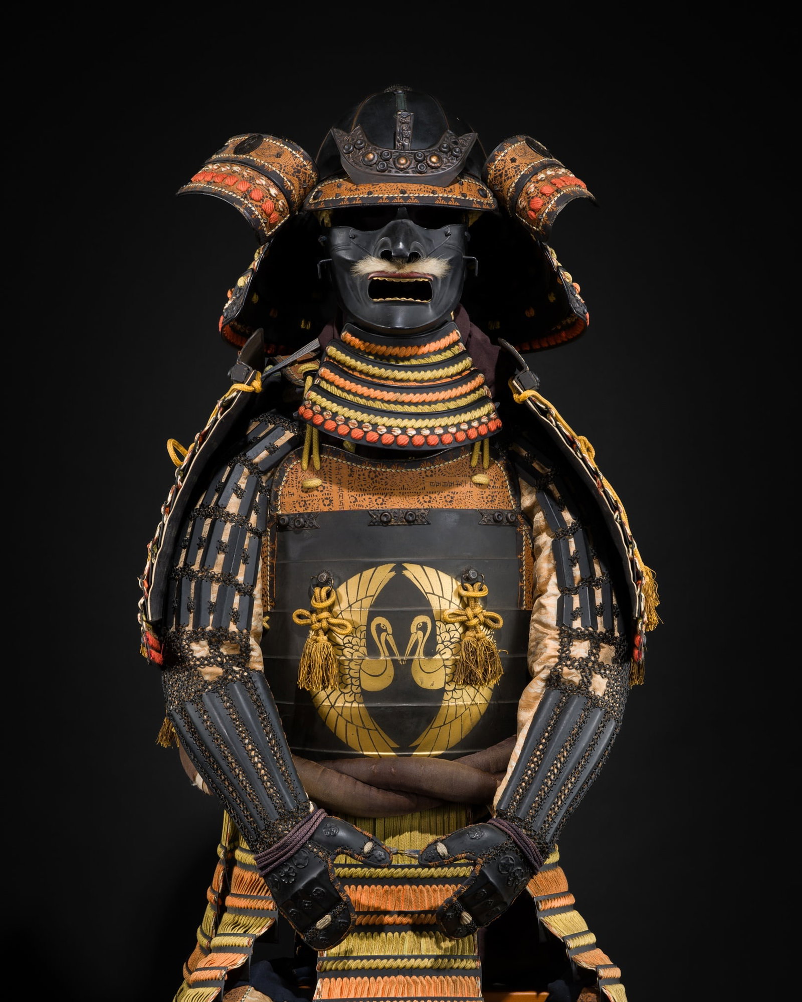AN OKEGAWA NIMAI-DO GUSOKU (TWO-PIECE CUIRASS ARMOR) AND AN IRON SUJIBACHI KABUTO: AN OKEGAWA NIMAI-DO GUSOKU (TWO-PIECE CUIRASS ARMOR) AND AN IRON SUJIBACHI KABUTO This lot is from a single owner collection and is therefore offered without reserve Japan, 20th century, Showa period 