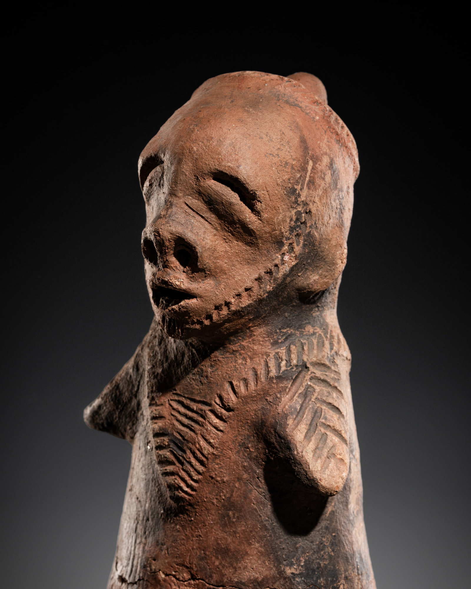 A DAKAKARI TERRACOTTA FUNERARY FIGURE, CIRCA EARLY 18TH CENTURY (1 of 11)