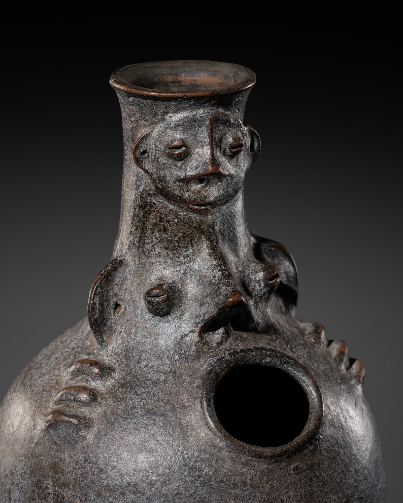 AN IGBO TERRACOTTA POT-DRUM, UDU, 20TH CENTURY (1 of 12)