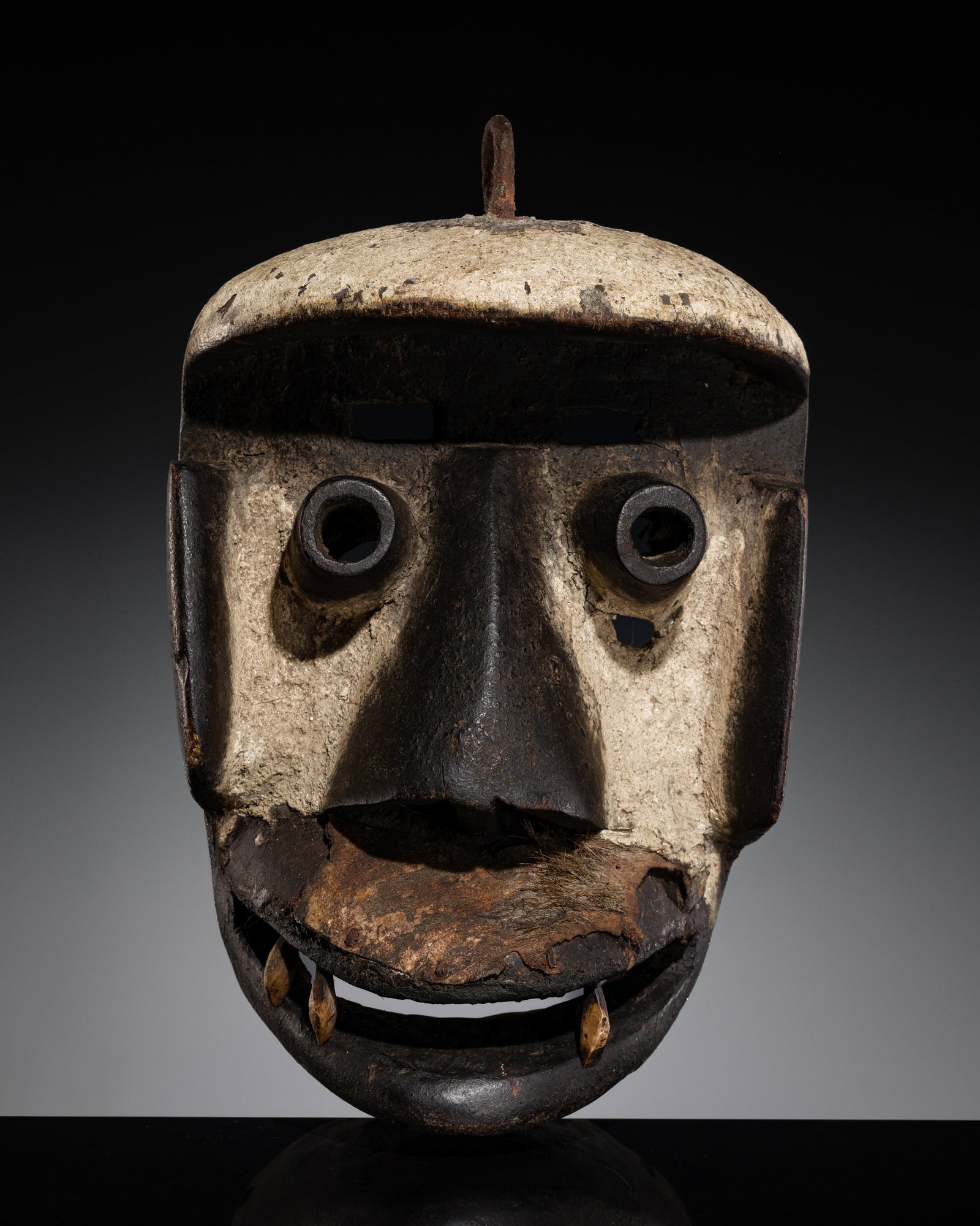 A DAN WOOD MASK, 19TH-EARLY 20TH CENTURY: A DAN WOOD MASK, 19TH-EARLY 20TH CENTURY This lot is from a single owner collection and is therefore offered without reserve Côte d'Ivoire. Boldly carved with an oval face, high protruding forehe