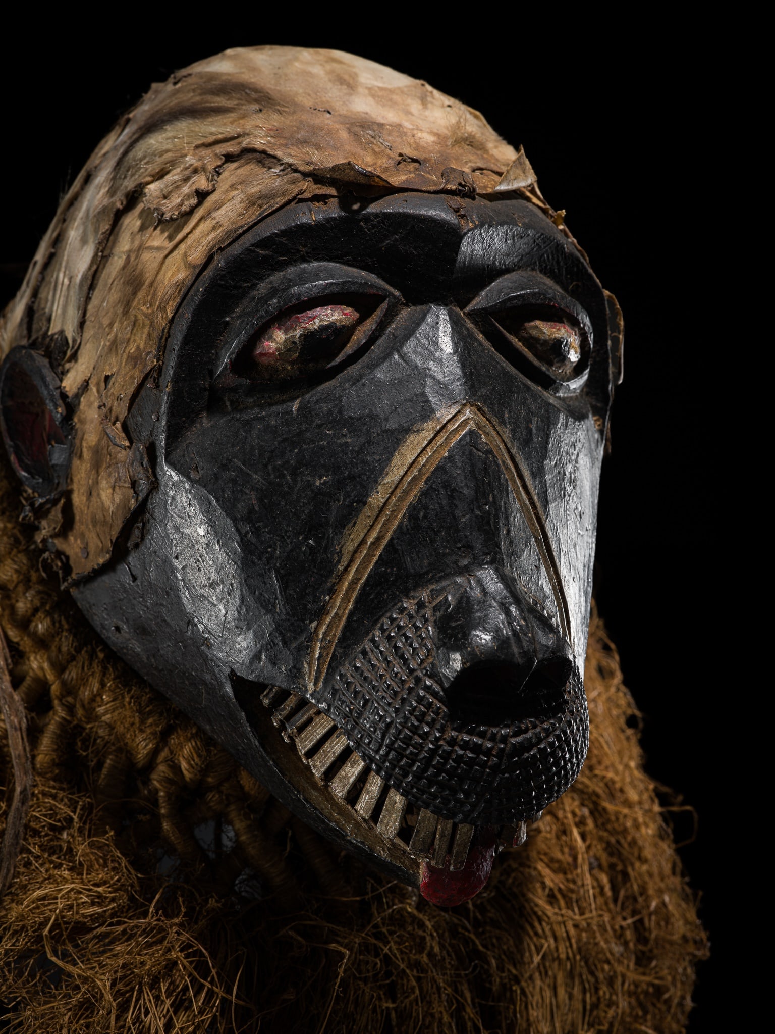 A LARGE IGBO POLYCHROME WOOD 'CHIMPANZEE' DANCE MASK, 20TH CENTURY (1 of 11)