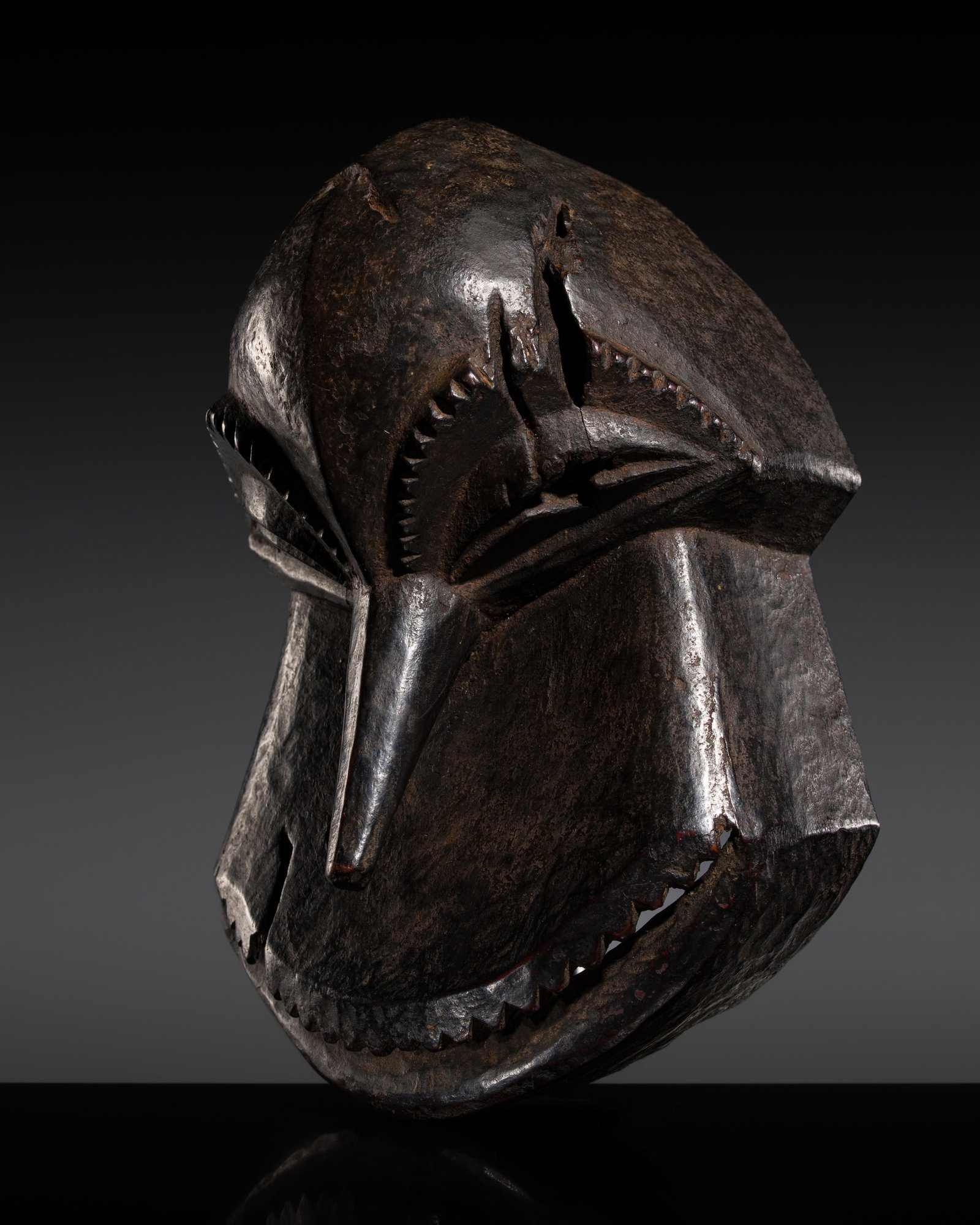 A HEMBA WOOD CHIMPANZEE MASK, MISI GWA SO'O, 20TH CENTURY: A HEMBA WOOD CHIMPANZEE MASK, MISI GWA SO'O, 20TH CENTURY This lot is from a single owner collection and is therefore offered without reserve Democratic Republic of Kongo. Finely carved, the face with