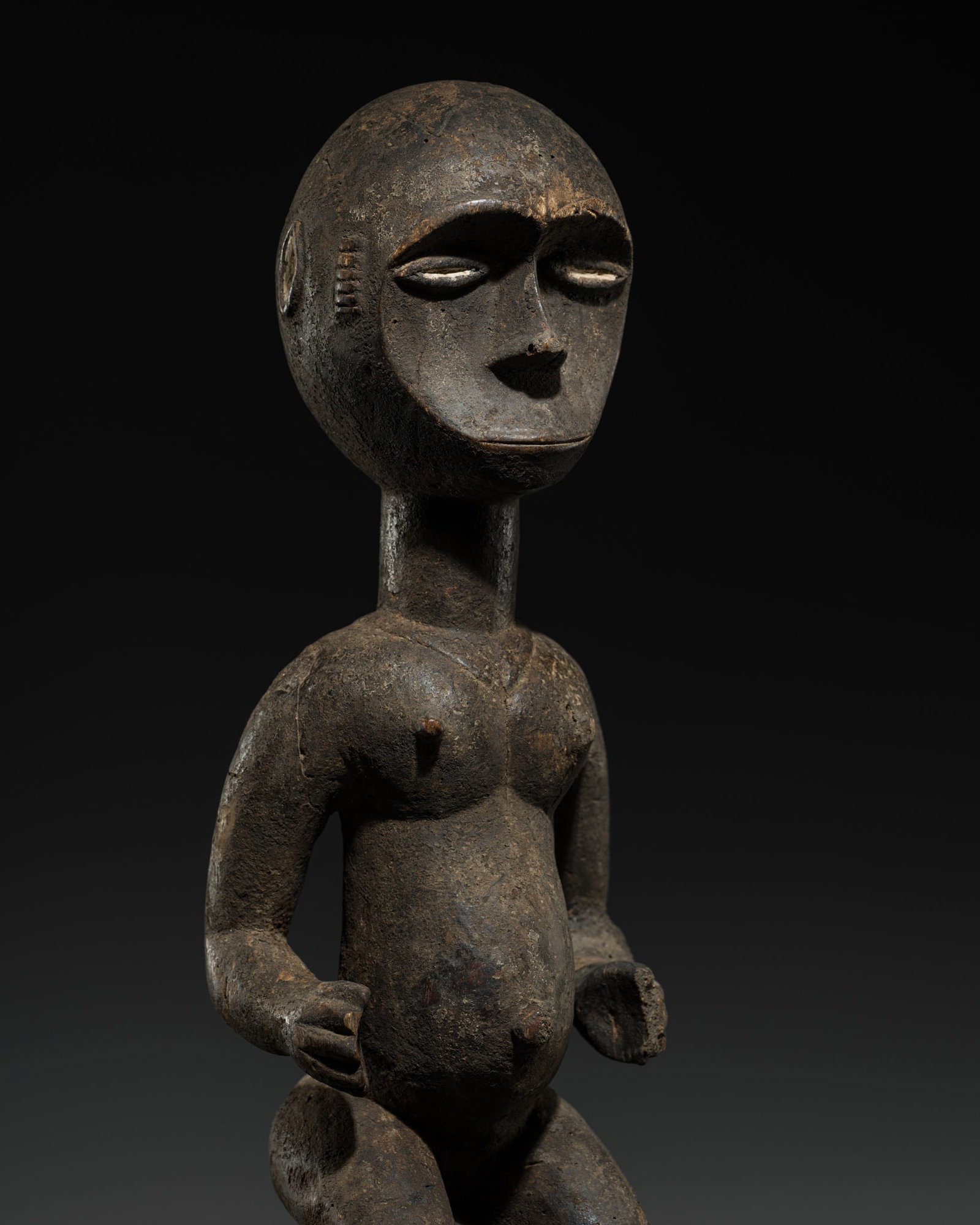 AN EKET WOOD FIGURAL HEADDRESS, MID-20TH CENTURY (1 of 14)