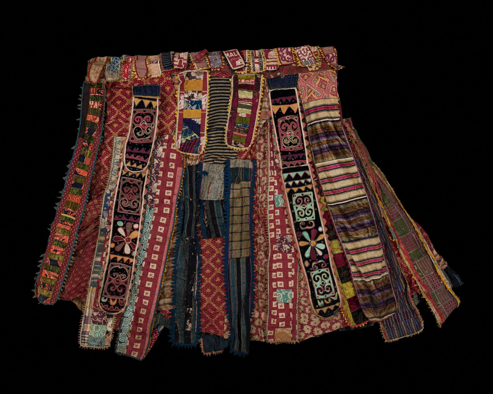 A FINE YORUBA EGUNGUN CEREMONIAL COSTUME, 20TH CENTURY (1 of 14)