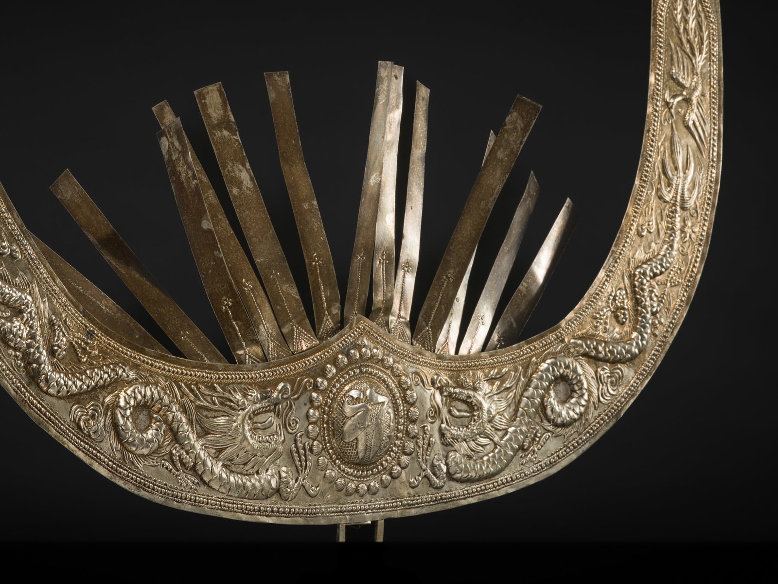 A METAL 'PHOENIX AND DRAGON' TOP OF A HEADDRESS, MIAO CULTURE, 20TH CENTURY (1 of 12)