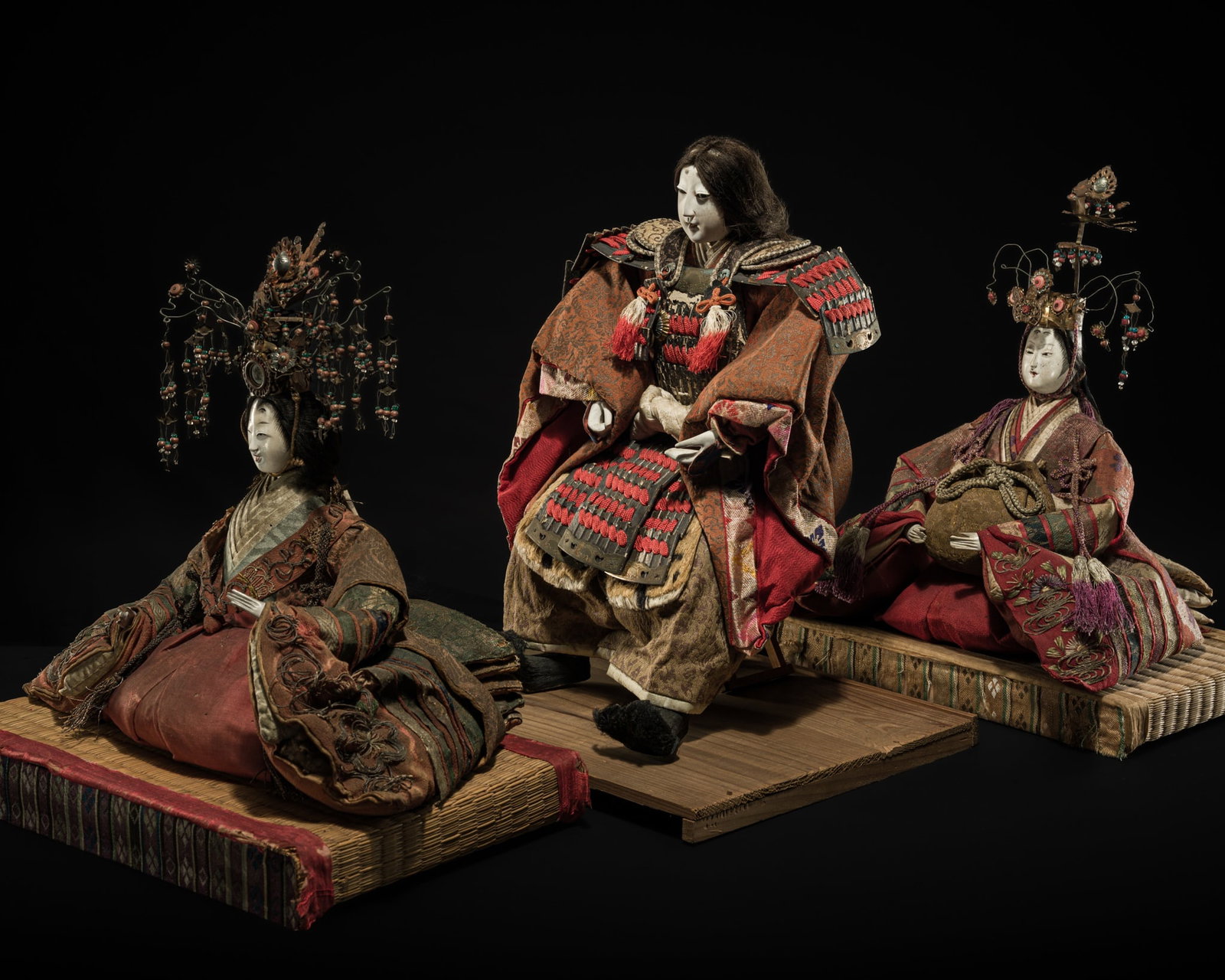 A GROUP OF THREE 'EMPRESSES AND WARRIOR' NINGYO DOLLS, LATE EDO PERIOD, CIRCA 1850: A GROUP OF THREE 'EMPRESSES AND WARRIOR' NINGYO DOLLS, LATE EDO PERIOD, CIRCA 1850 This lot is from a single owner collection and is therefore offered without reserve Japan. Each figure designed with 