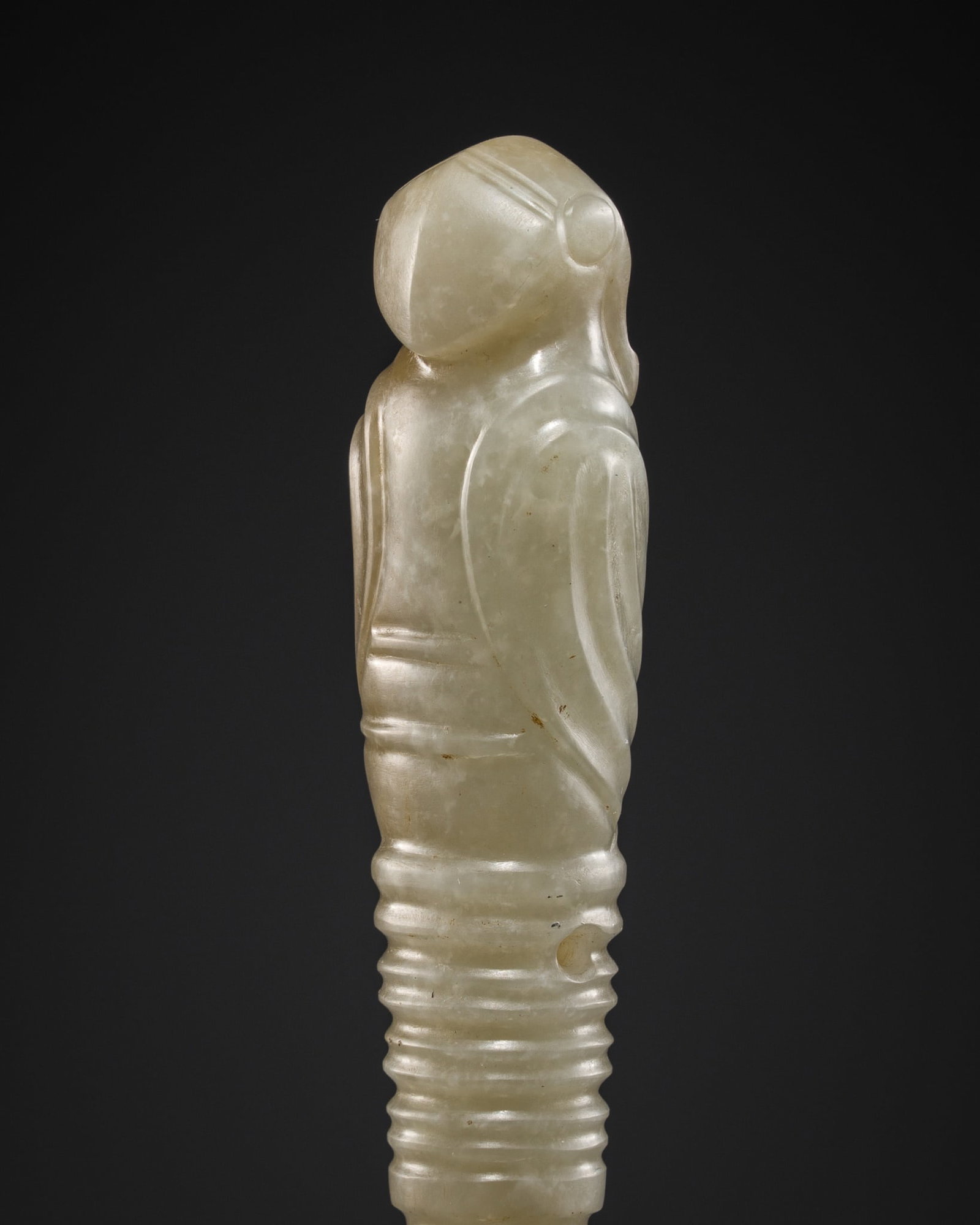A RARE PALE CELADON JADE 'EAGLE' HAIR ORNAMENT, JI, LATE NEOLITHIC PERIOD, SHIJIAHE CULTURE: † A RARE PALE CELADON JADE 'EAGLE' HAIR ORNAMENT, JI, LATE NEOLITHIC PERIOD, SHIJIAHE CULTURE Expert authentication: Dr. Gu Fang has examined the present lot and confirms its authenticity and th