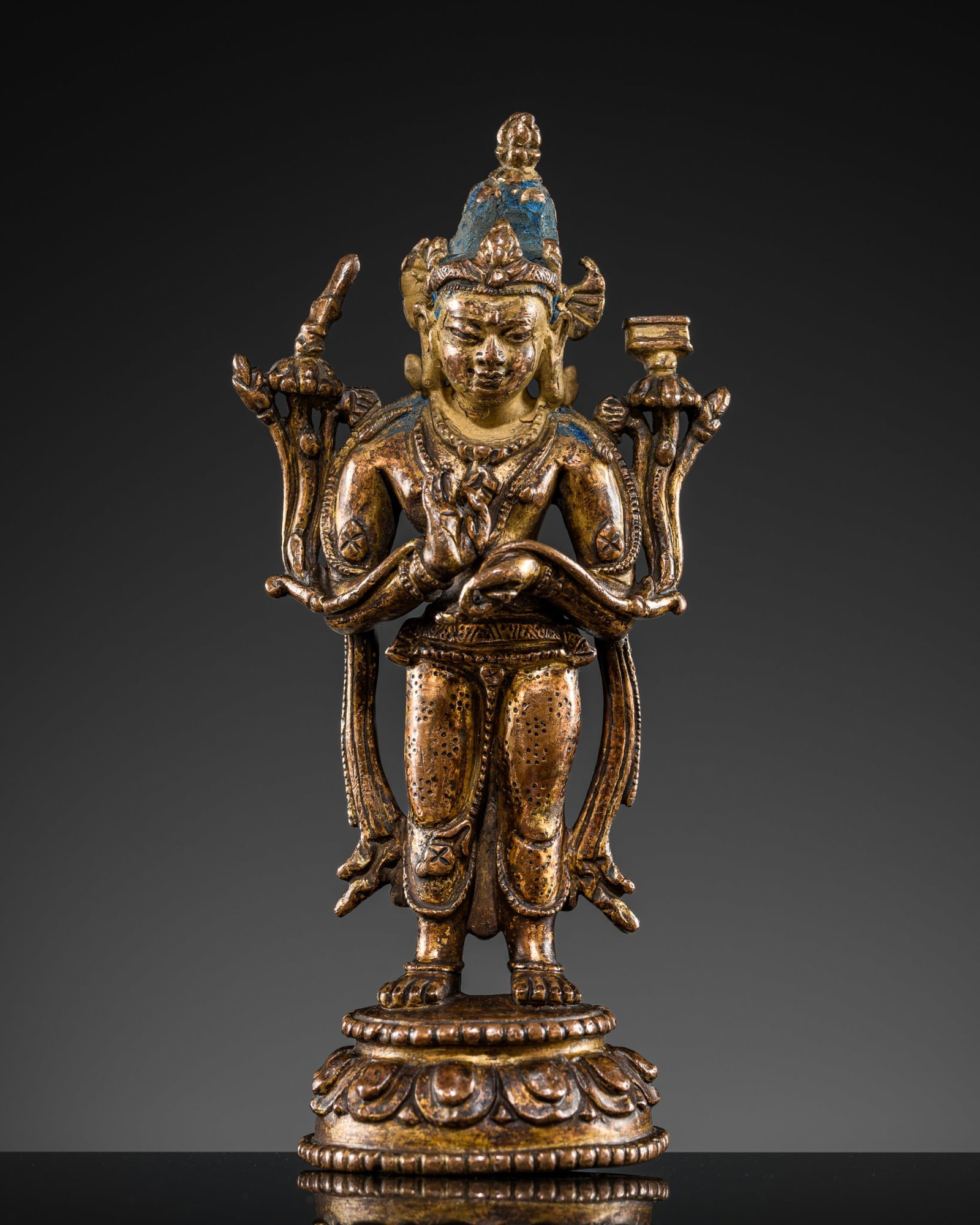 A COPPER ALLOY FIGURE OF MANJUSHRI, TIBET, 13TH-14TH CENTURY (1 of 17)