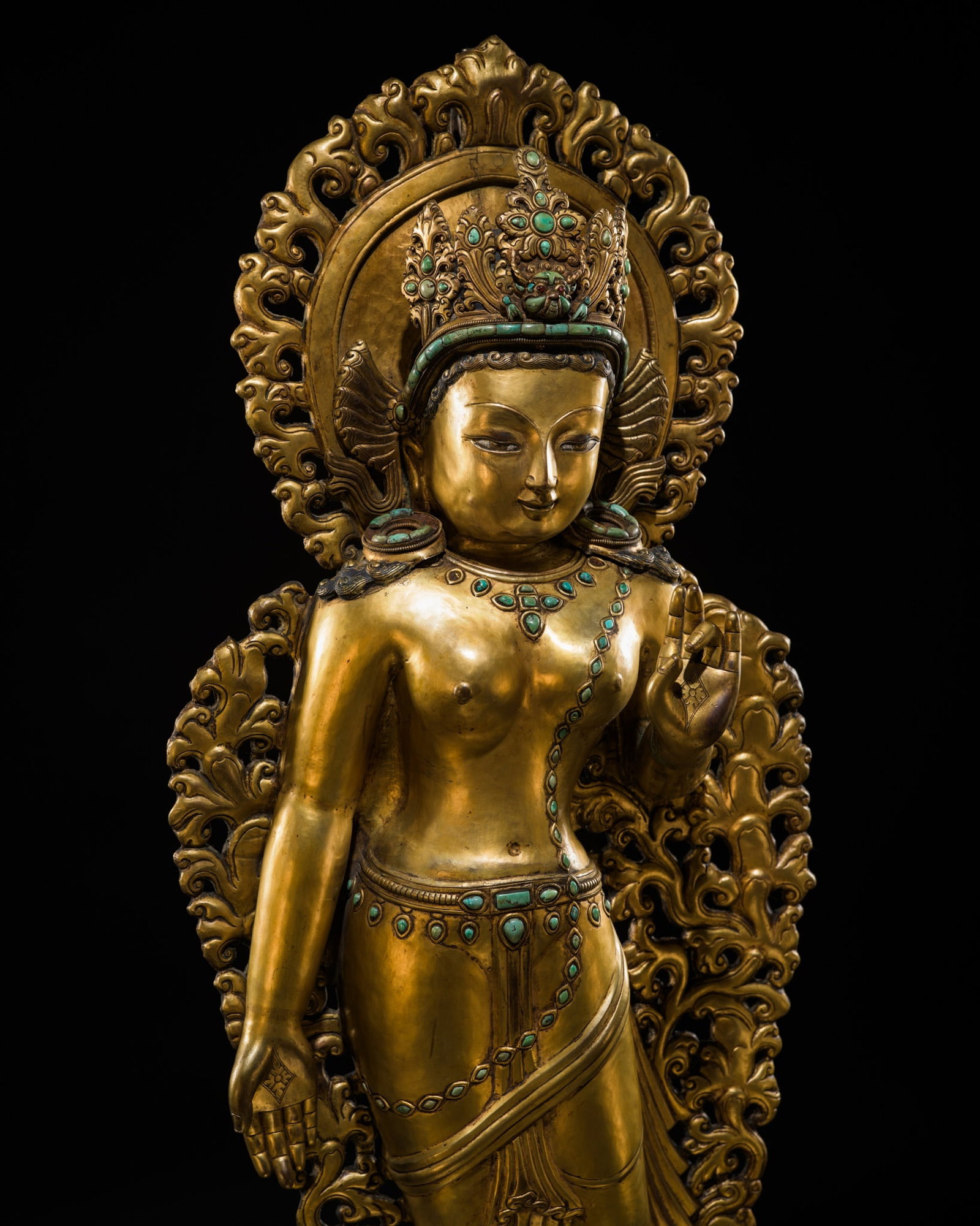 A VERY LARGE (117 CM) TURQUOISE-INLAID GILT-COPPER REPOUSSÉ FIGURE OF TARA, NEPAL, 18TH-19TH: A VERY LARGE (117 CM) TURQUOISE-INLAID GILT-COPPER REPOUSSÉ FIGURE OF TARA, NEPAL, 18TH-19TH CENTURY OR EARLIER Expert's note At 117 cm, the present repoussé figure is exceptional in scale e