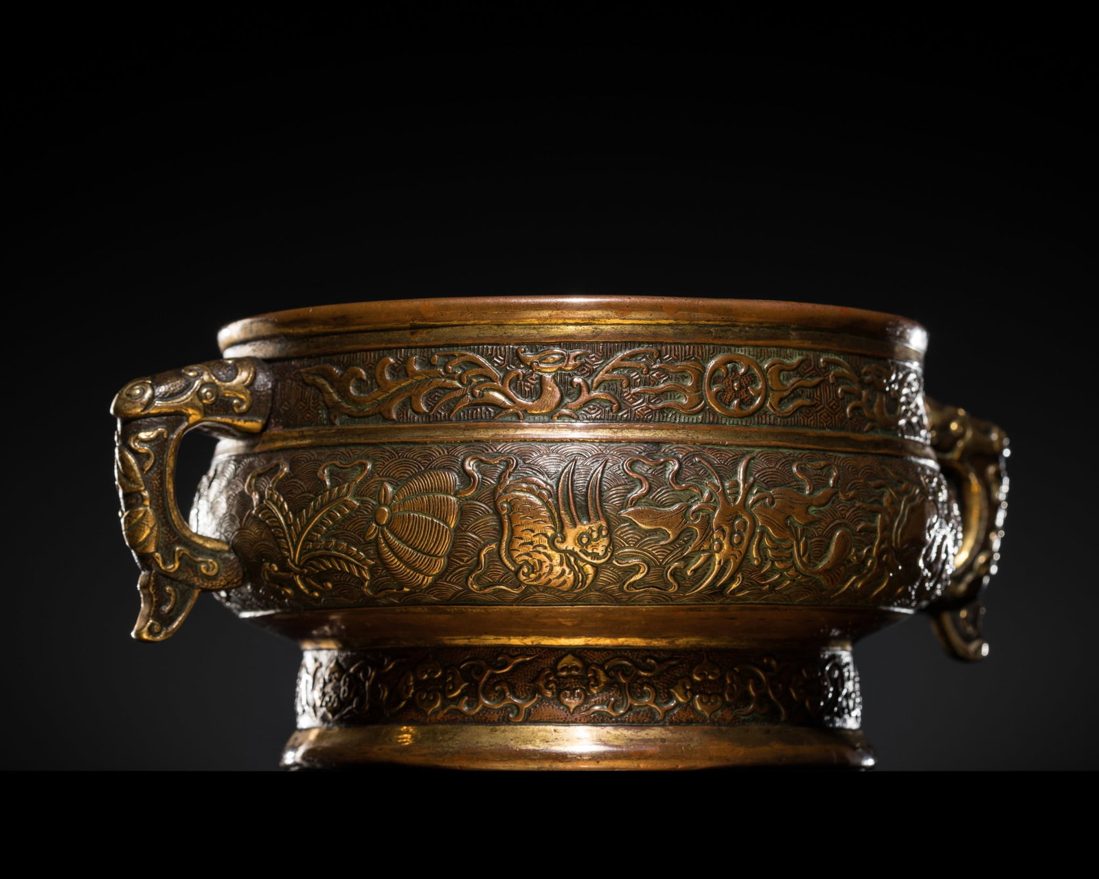 A PARCEL-GILT 'MYTHICAL SEA CREATURES' BRONZE CENSER, GUI, MING DYNASTY, SIGNED HU WENMING (1 of 18)