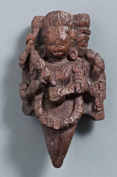 VAJRAKILA (RITUAL DAGGER) IN THE FORM OF THE MAHAKALA: VAJRAKILA (RITUAL DAGGER) IN THE FORM OF THE MAHAKALAâ€œ. Wood. Nepal, 19th cent. HEIGHT 13 CM This Vajrakila is portrayed in the six-armed form of the Dharmapala (protector of the doctrine) Mahak