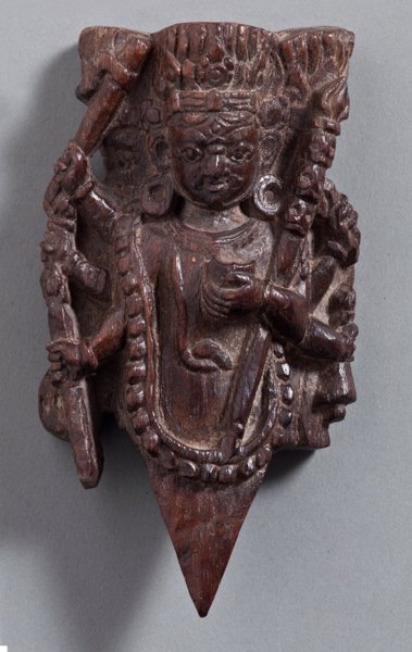 VAJRAKILA (RITUAL DAGGER) IN THE FORM OF THE MAHAKALA: VAJRAKILA (RITUAL DAGGER) IN THE FORM OF THE MAHAKALAâ€œ. Wood. Nepal, 19th cent. HEIGHT 13 CM This Vajrakila is portrayed in the six-armed form of the Dharmapala (protector of the doctrine) Mahak