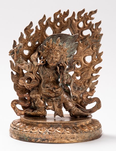VAJRAPANI WITH FLAMING AUREOLE: VAJRAPANI WITH FLAMING AUREOLE. Gilt bronze. Nepal, 20th cent. HEIGHT 27,2 CM A gilt bronze sculpture of a Vajrapani crafted with rich details.