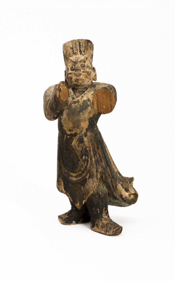 GUARDIAN FIGURE: Wood with remnants of paint. China, Qing A guardian altar figure of one of the four â€œheavenly kingsâ€, the Tian Wang. Expressive facial features, vivid clothing. Missing parts, patina. HEIGHT