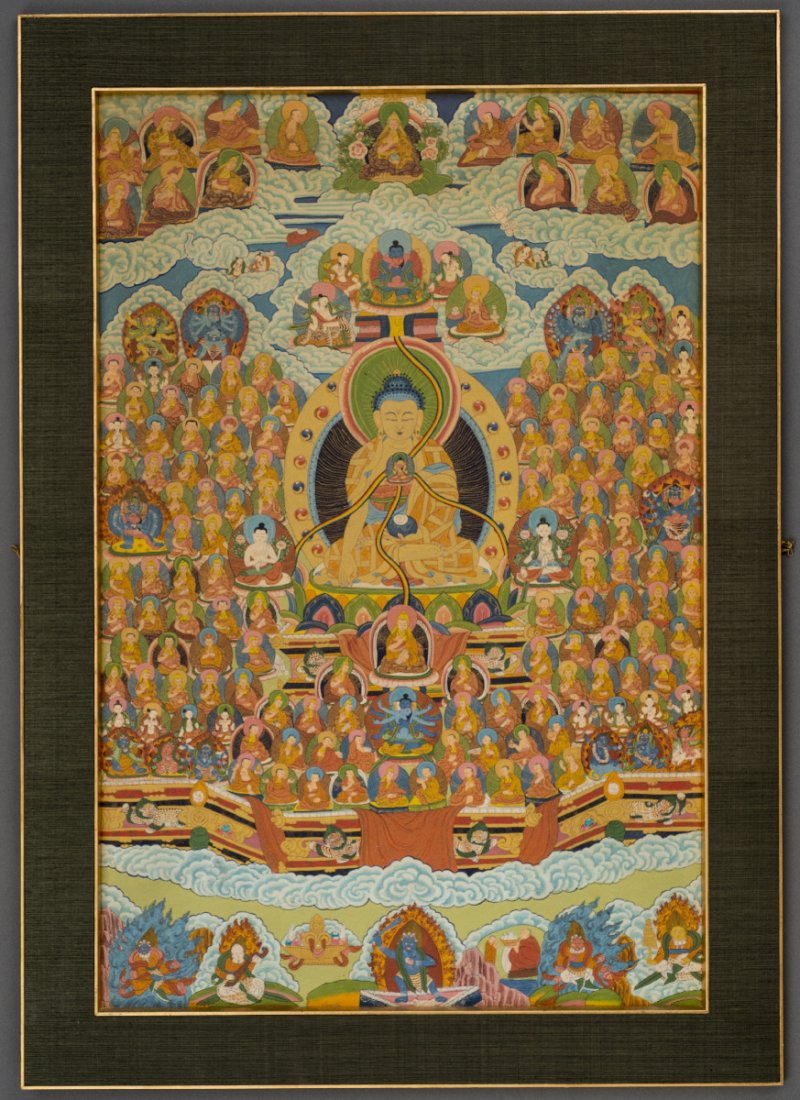 BUDDHA SHAKYAMUNI AS SUPREME OF THE ORDER: Thangka painting on textile. Sino-Tibetan, 20th cent. A superb thangka, rich in figural depictions of Buddhas, bodhisattvas, saints and monastic scholars (acaryas). The lower section presents krodha-d