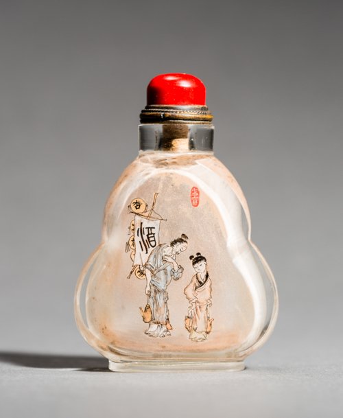 SNUFF BOTTLE: Glass. China, 20th Century Beautiful inside-painted glass bottle in the form of a double gourd. On one side the Chinese character for Wine (Jiu). Depicted is an old man with his apprentice girl, both 