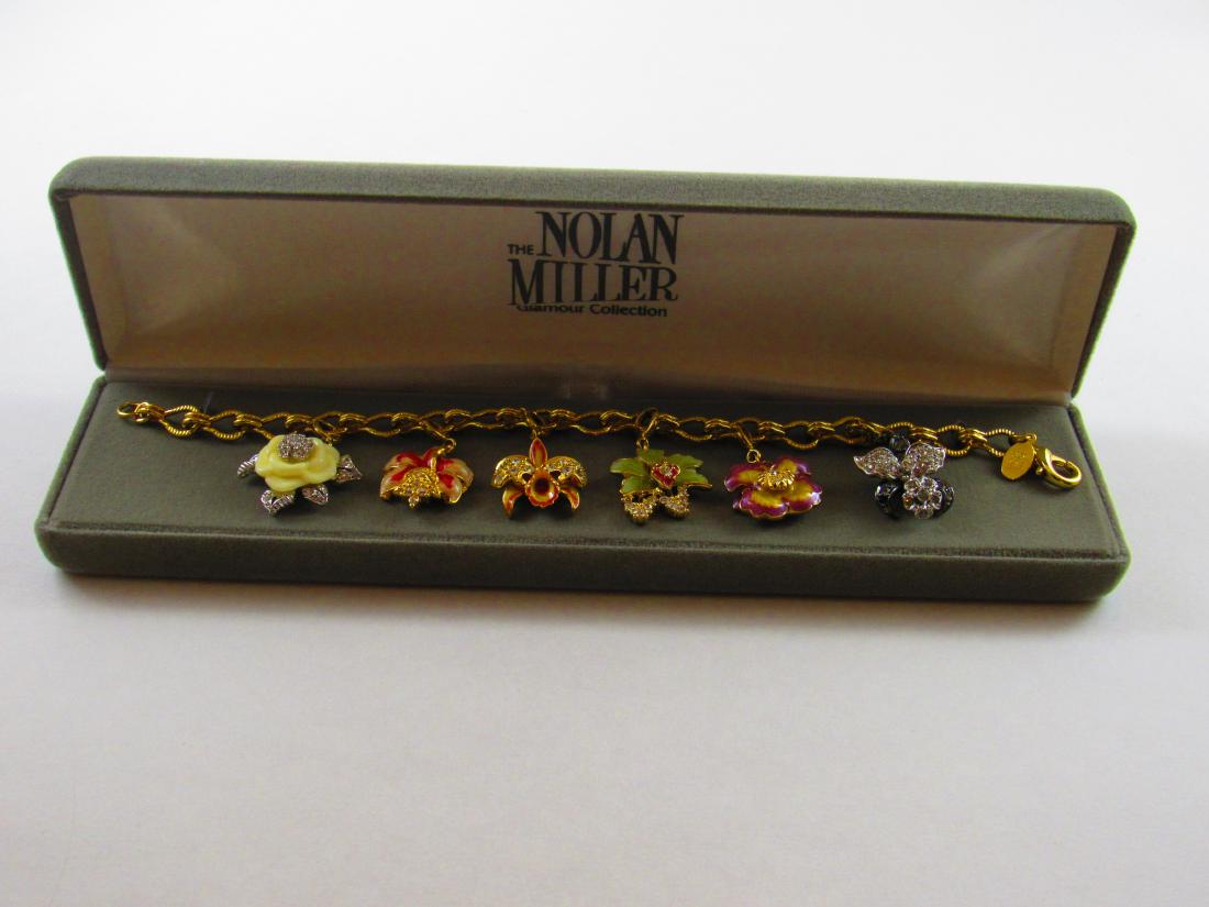 Boxed Nolan Miller orchid charm bracelet (1 of 4)