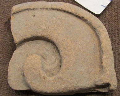 Pre-Columbian Clay Tile/Edge Fragment: By 1958, the owner remembers this in the family home. From 500-1500 years old, likely Mexican, clay curved corner or edge fragment, showing a raised edge or border, 2 1/8 " wide by 2" tall by close